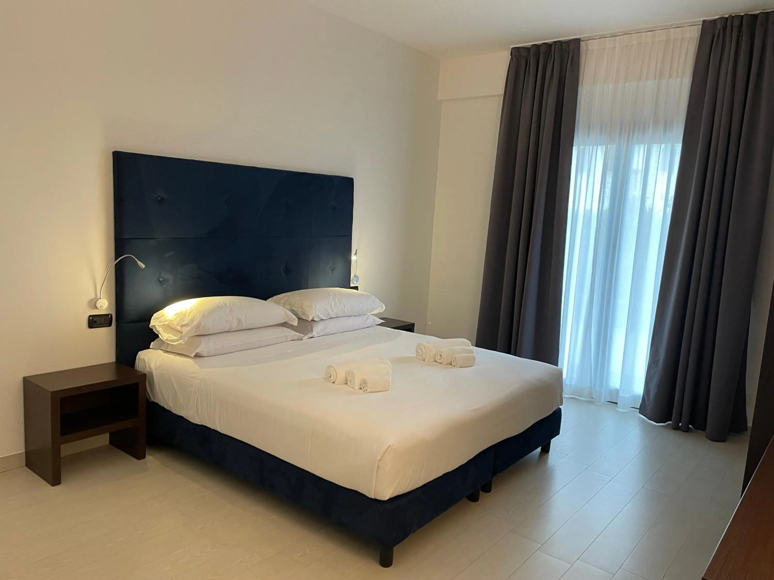 Bedroom, Bed in Maestrale Resort Hotel - Grosseto