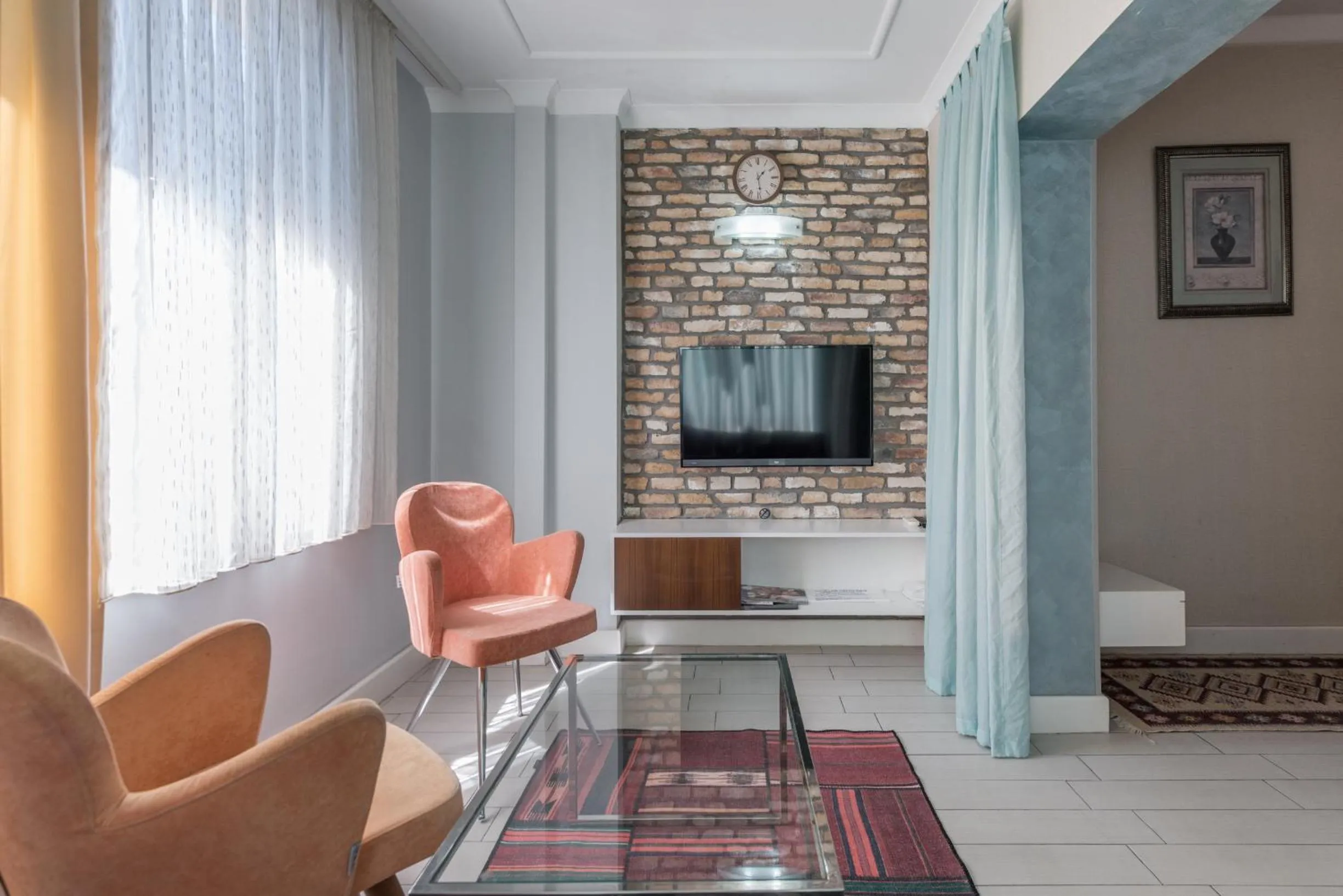 Seating area in Delight Deluxe Aparts