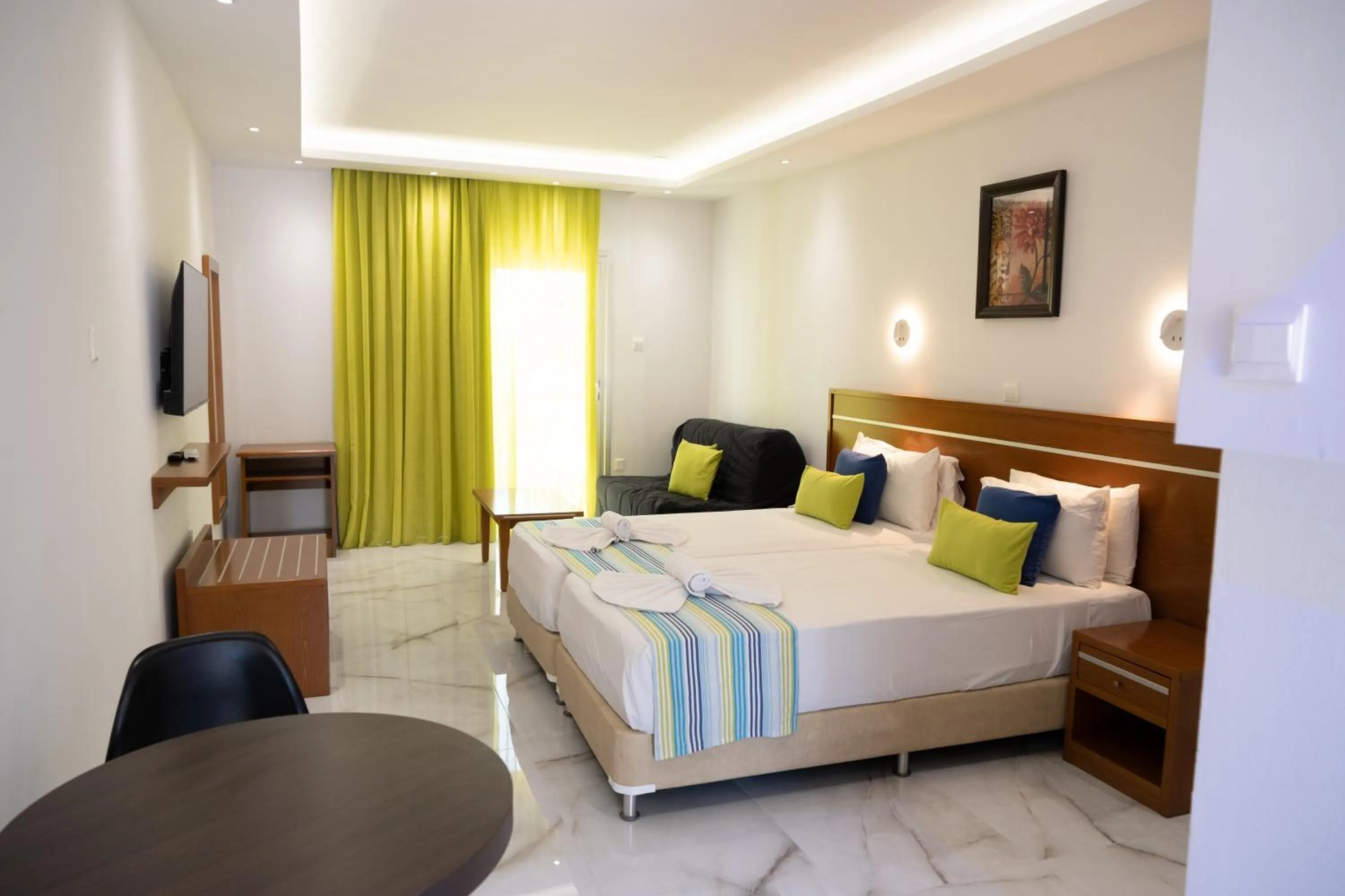 Bed in Loutsiana Deluxe Apts