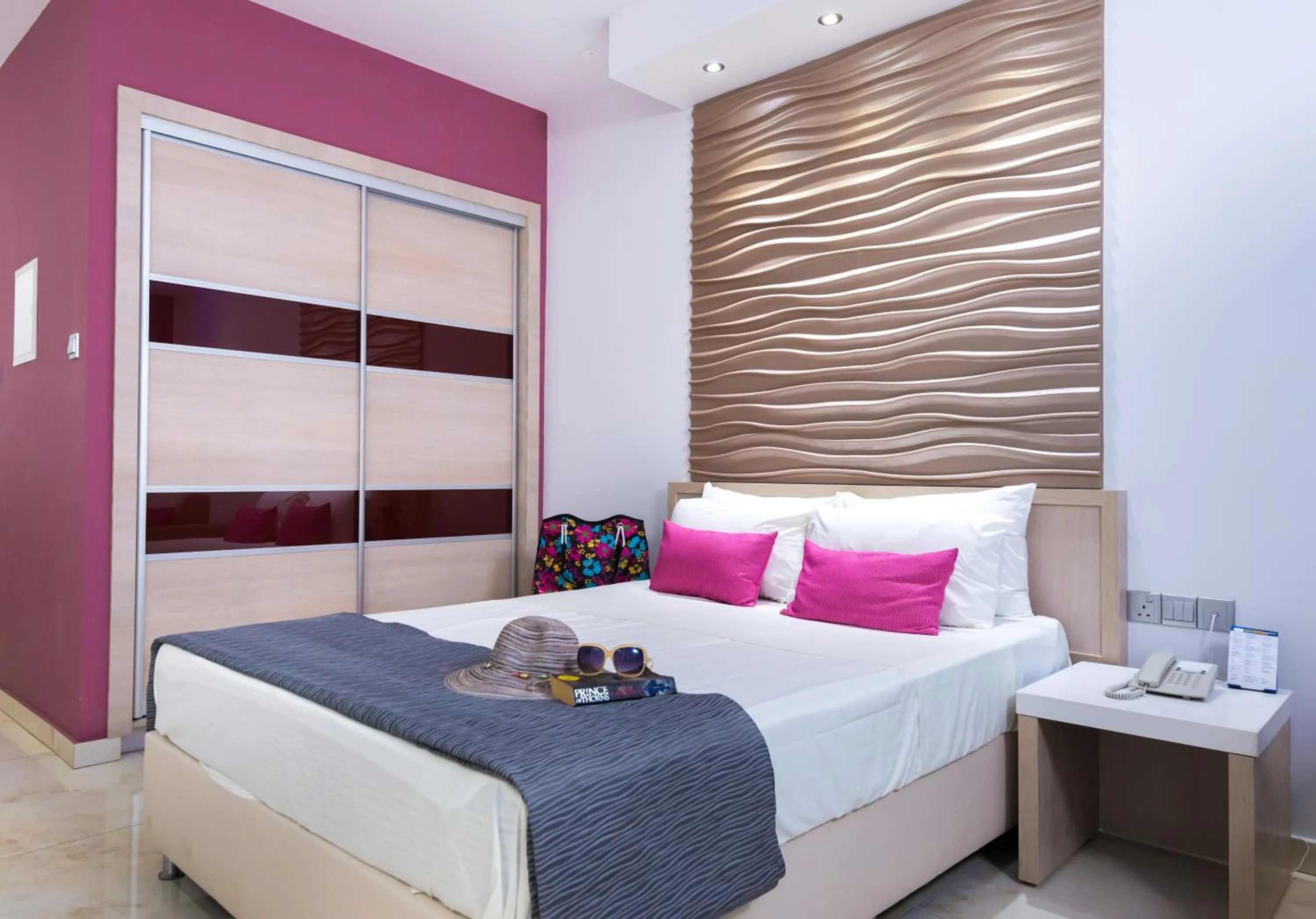 Bed in Loutsiana Deluxe Apts