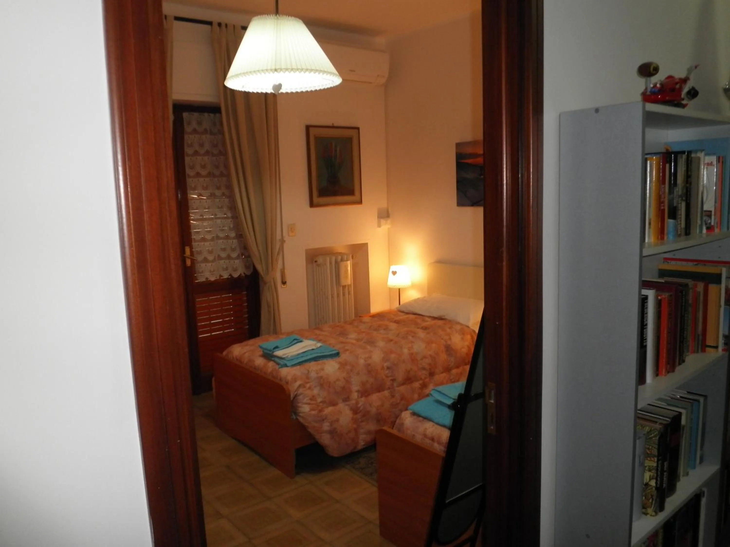 Photo of the whole room, Bed in Don Milani