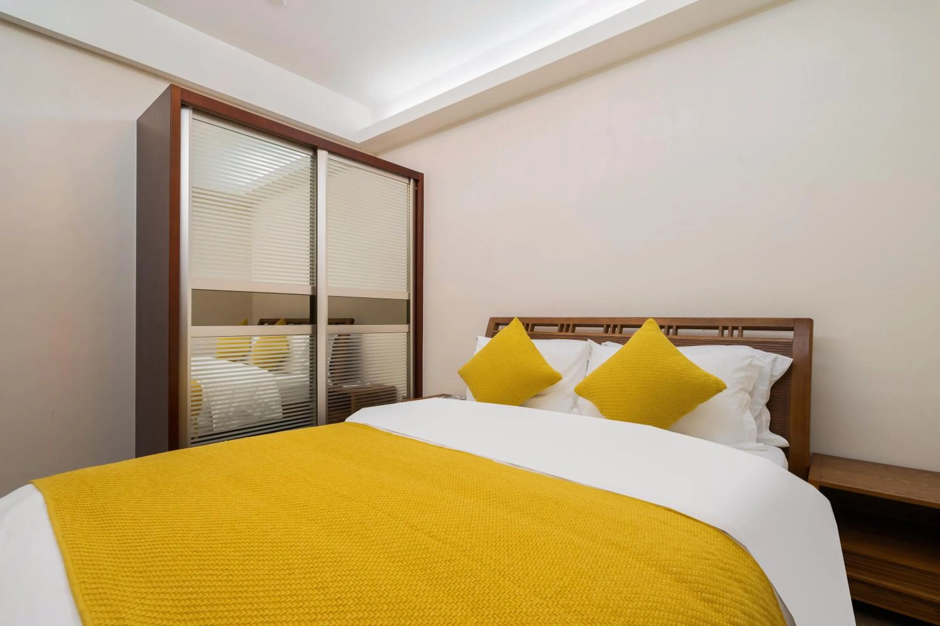 Bedroom, Bed in Sanya Yikehai View Apartments