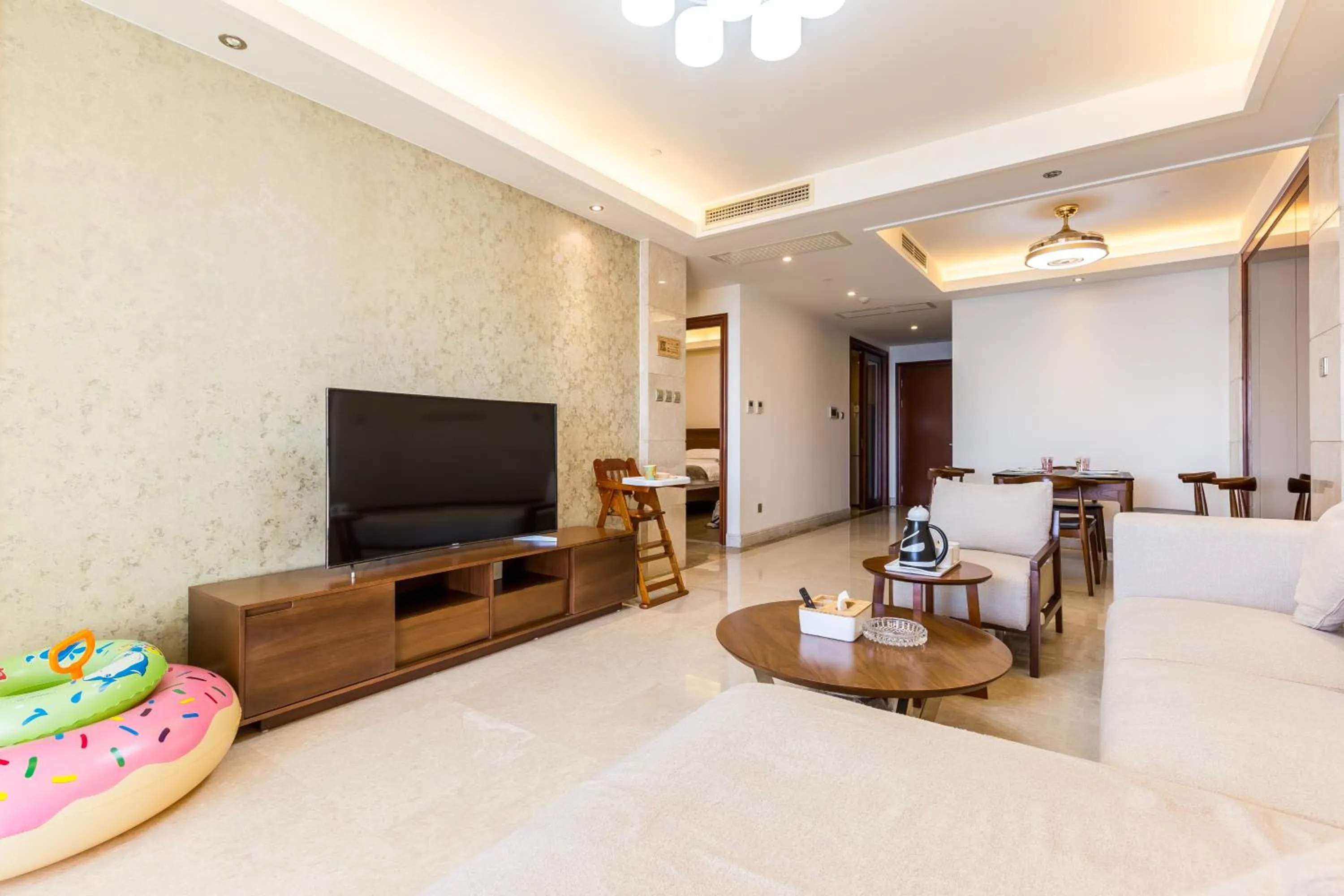 Living room, Bed in Sanya Yikehai View Apartments