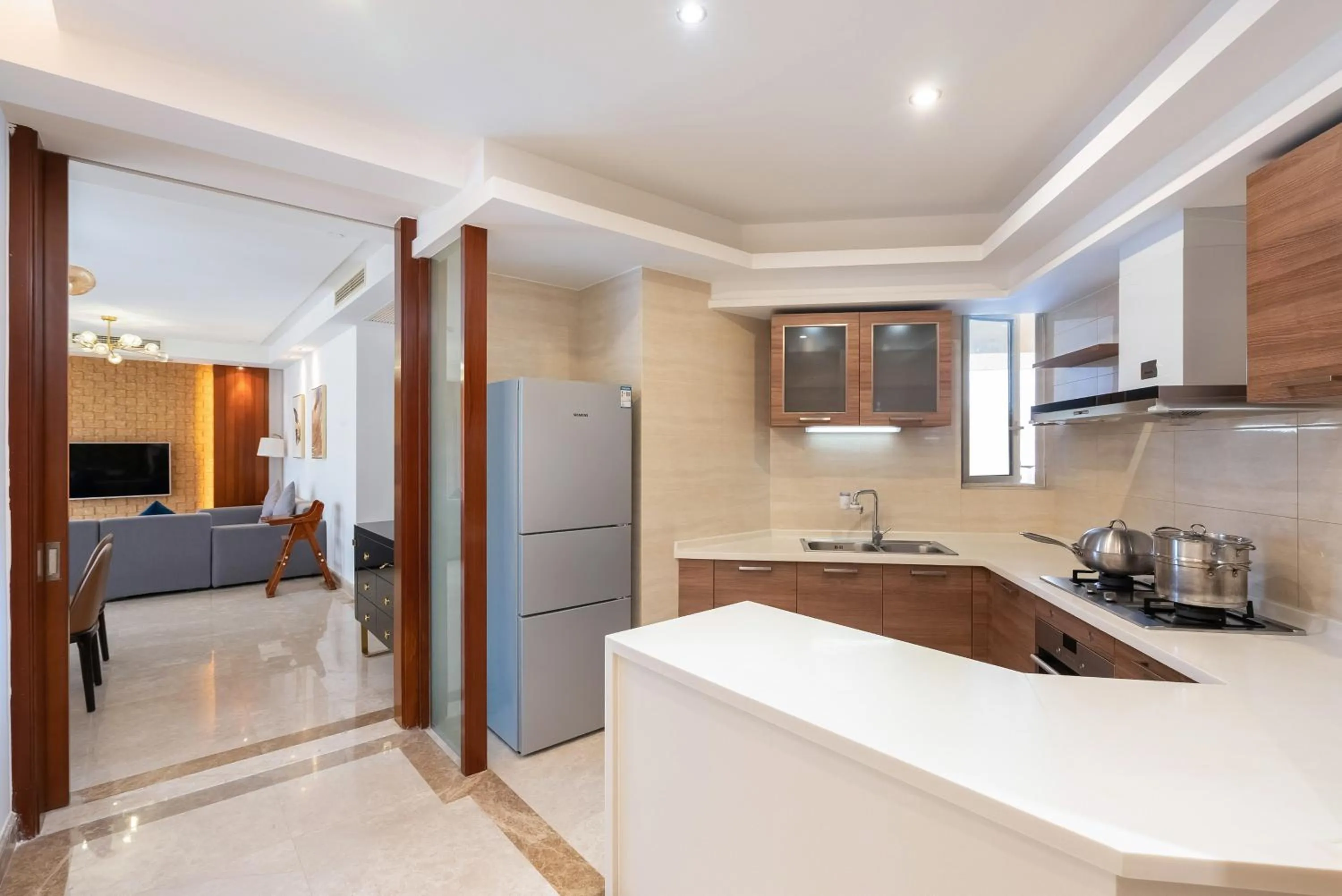 Kitchen or kitchenette in Sanya Yikehai View Apartments