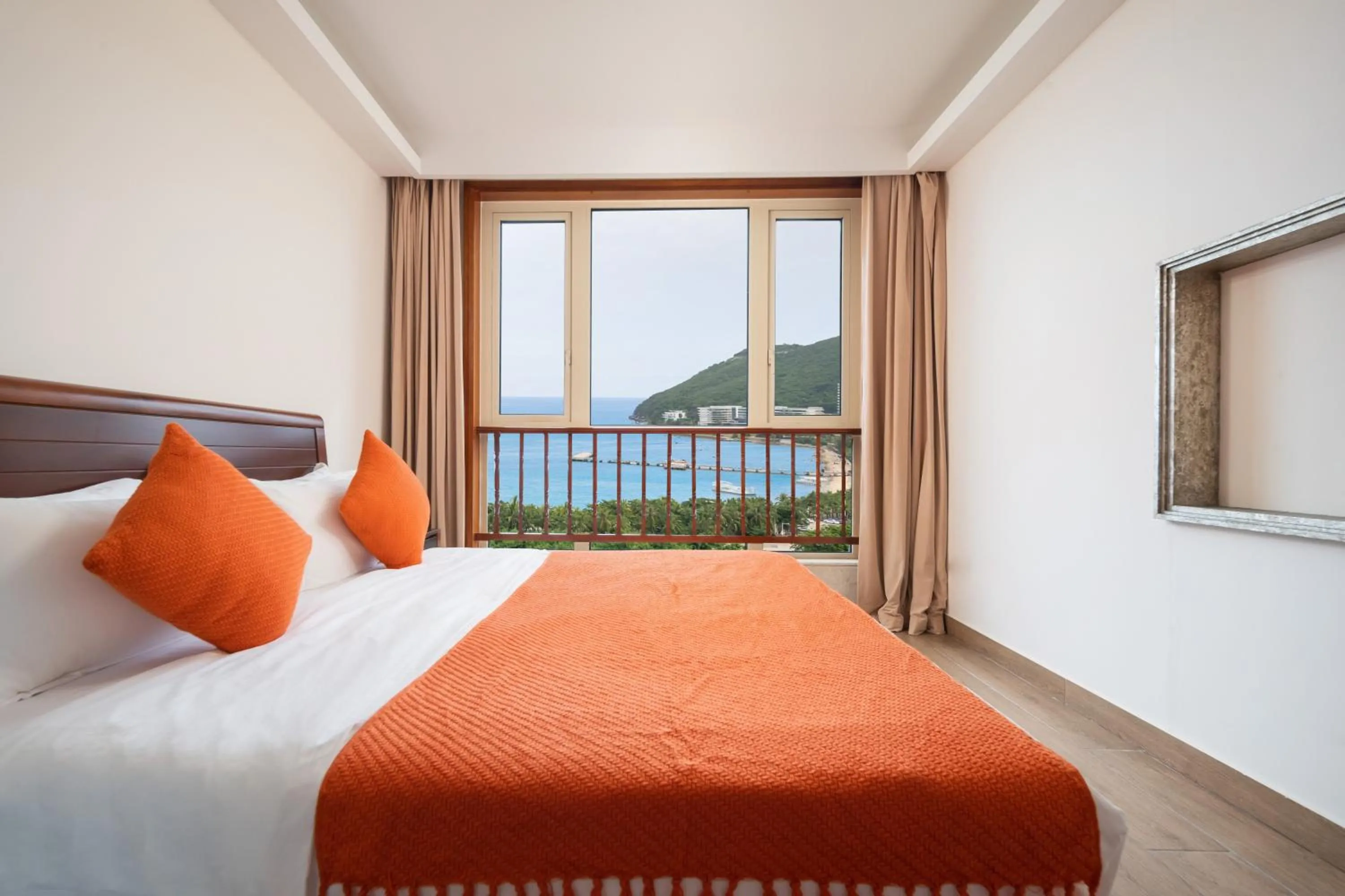 Bed in Sanya Yikehai View Apartments