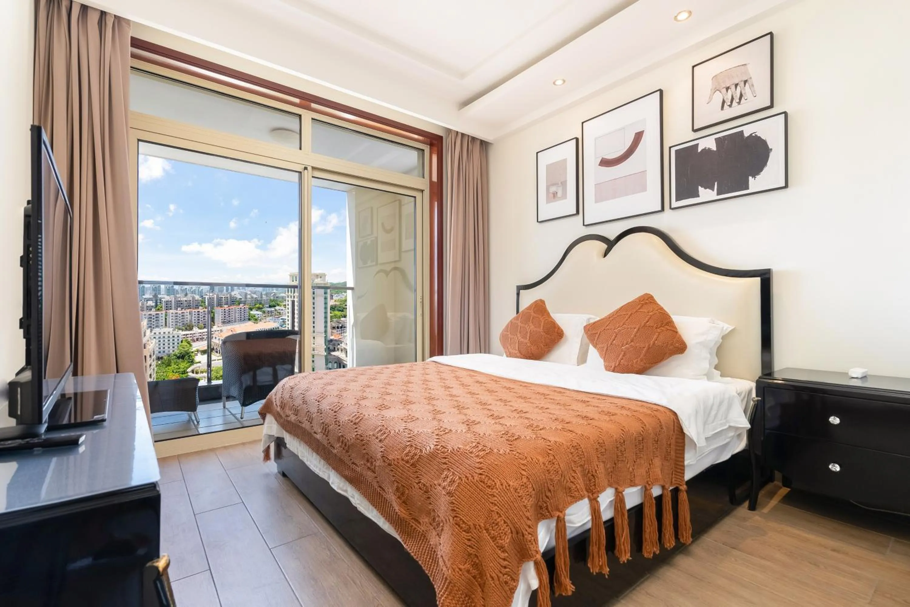 Bed in Sanya Yikehai View Apartments