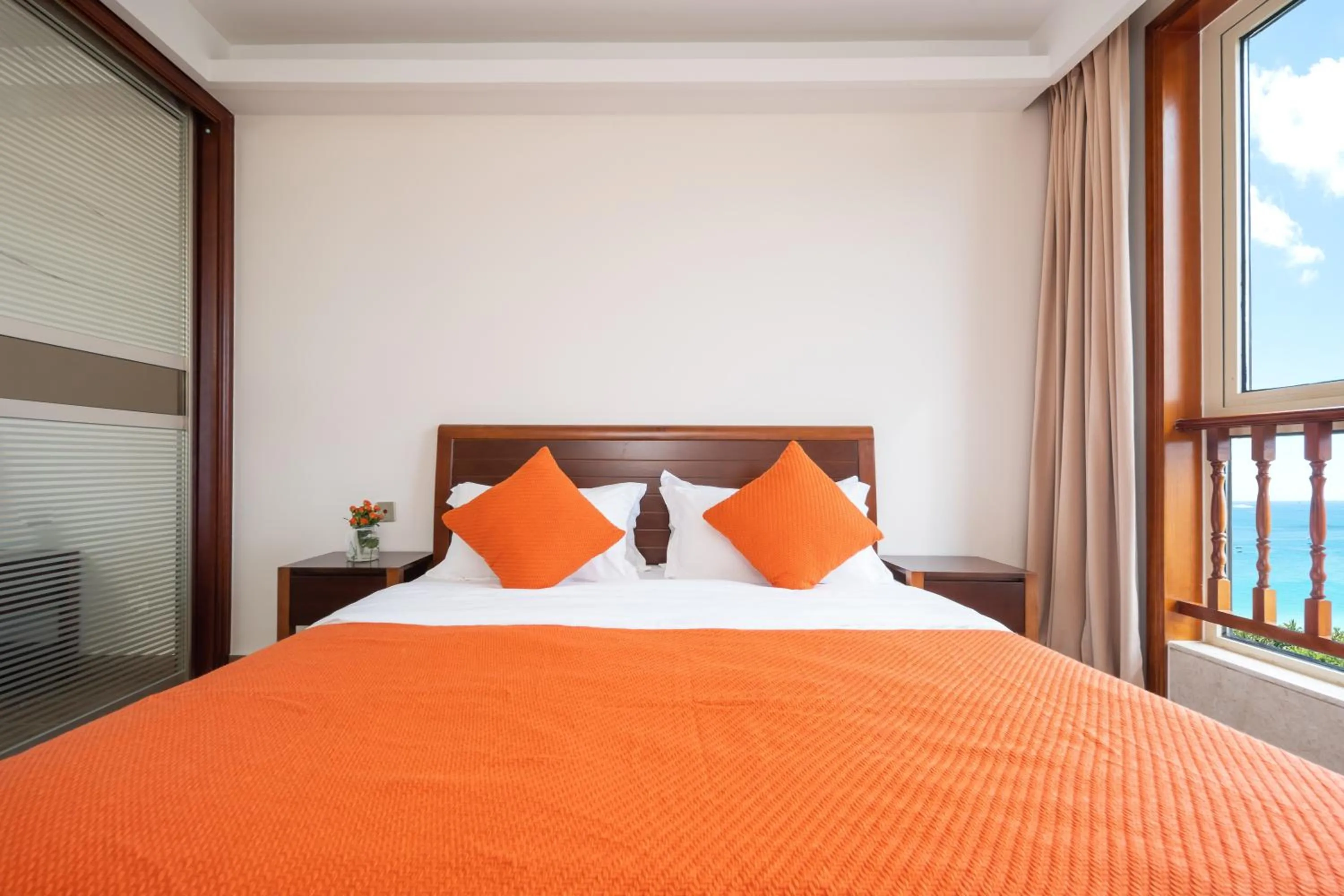 Bed in Sanya Yikehai View Apartments