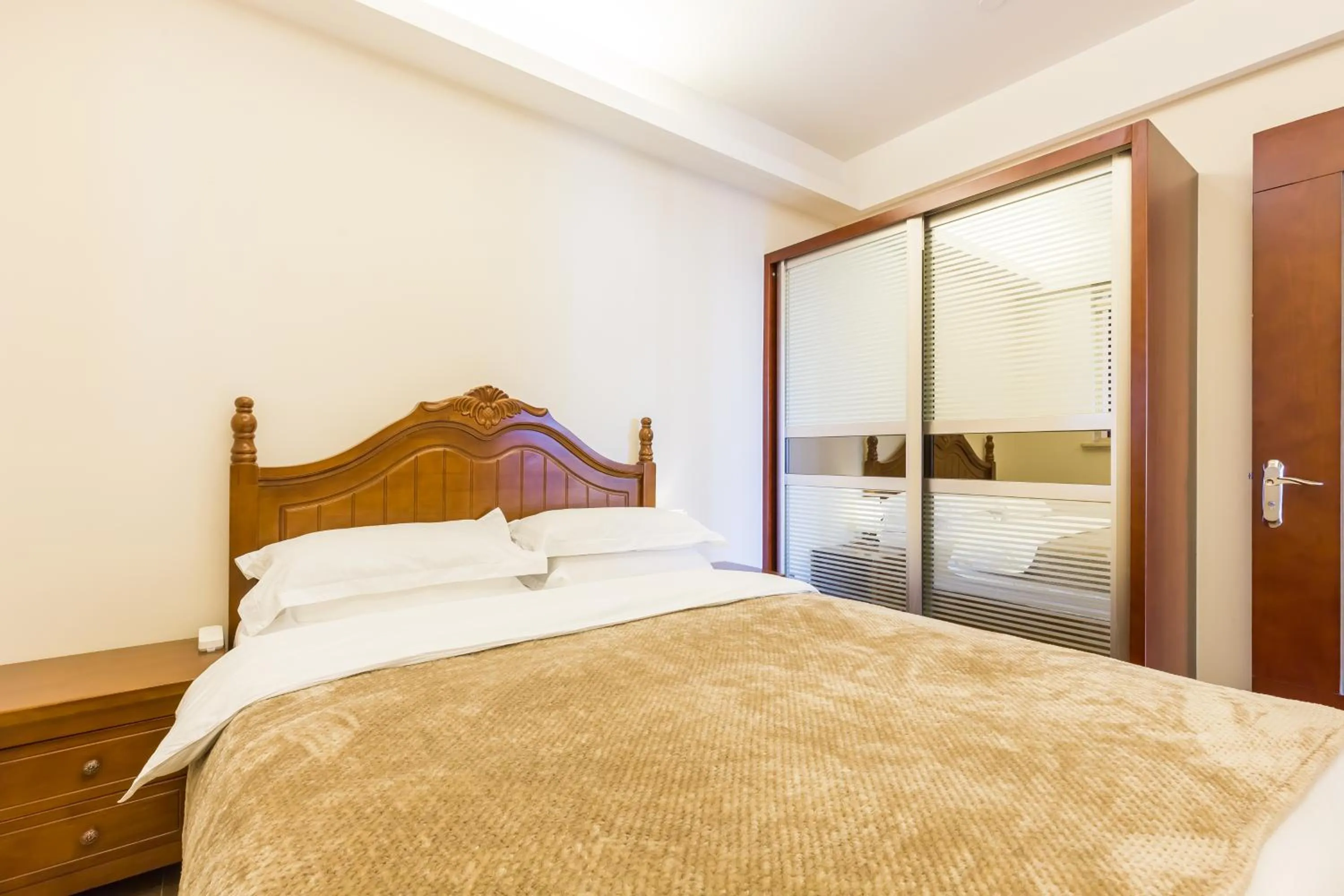 Bedroom, Bed in Sanya Yikehai View Apartments