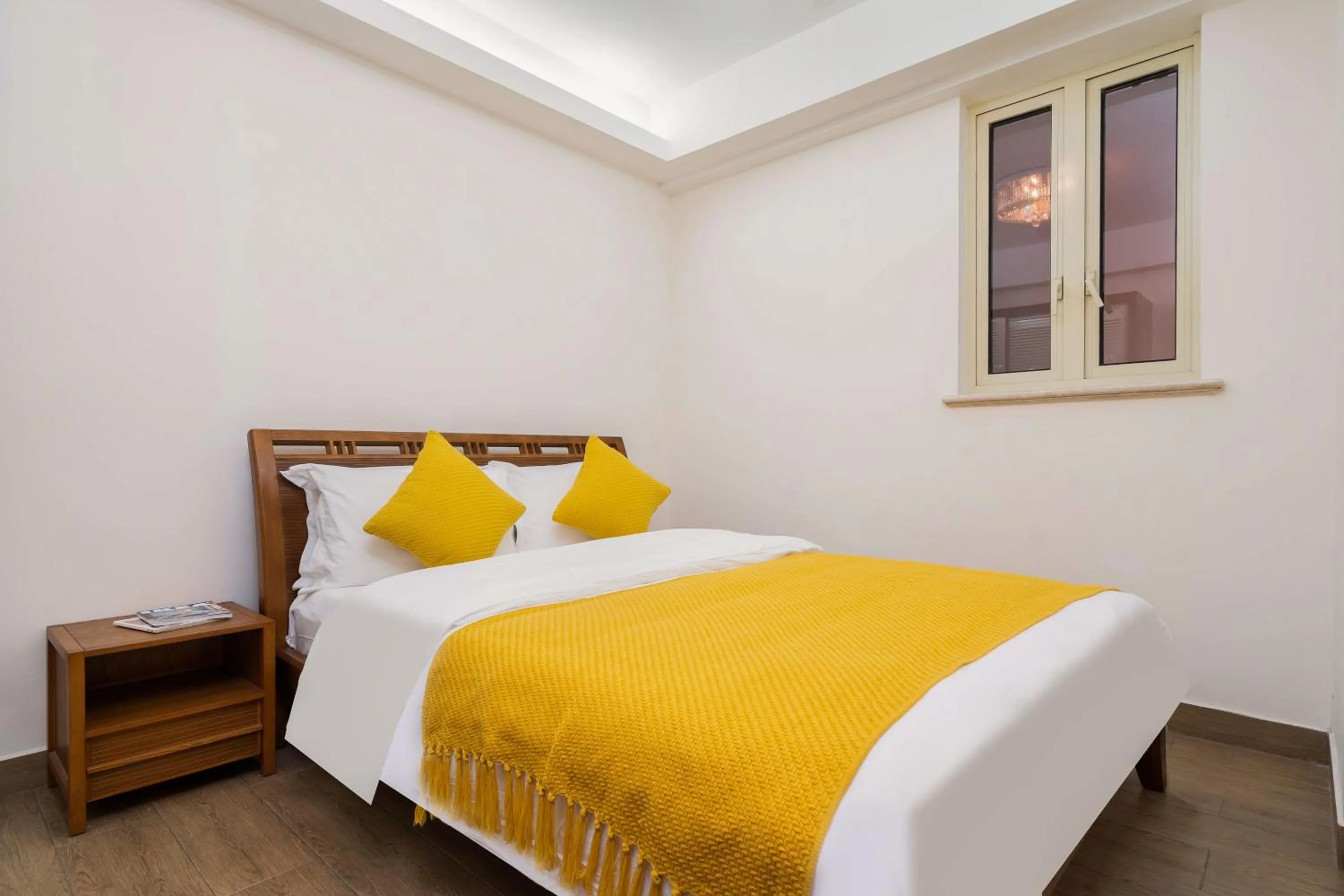 Bedroom, Bed in Sanya Yikehai View Apartments