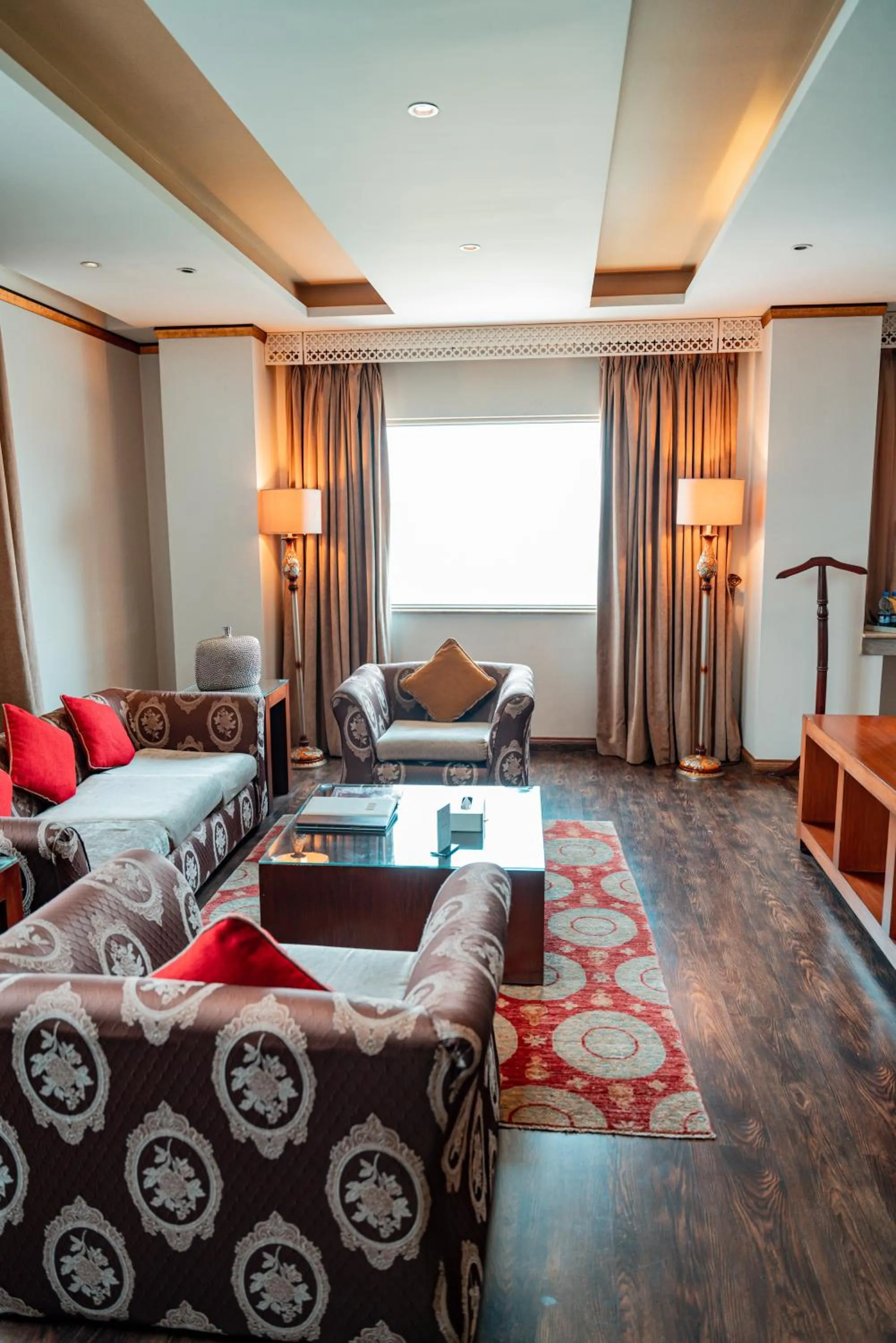 Seating area, Bed in Luxus Grand Hotel