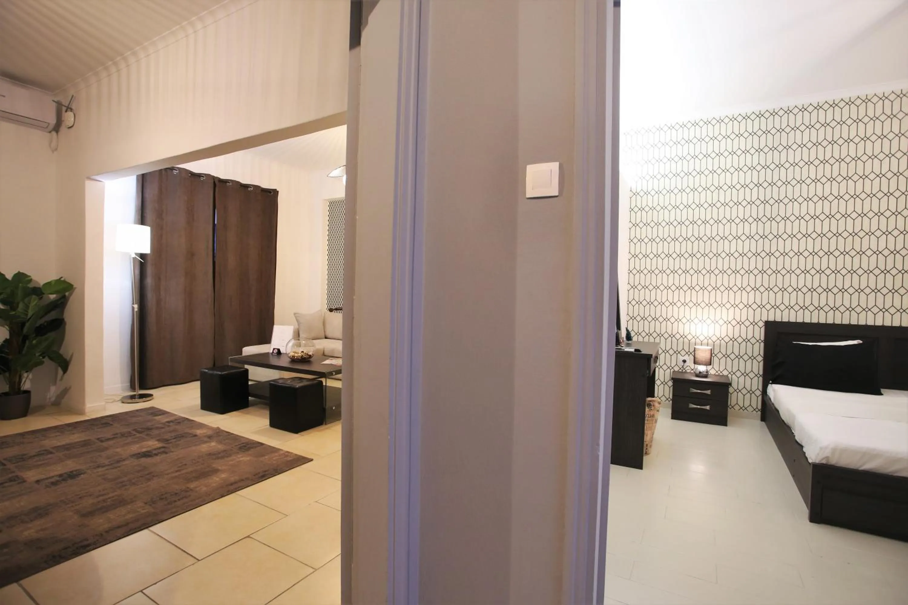 Living room, Bed in GK Athens by GK Properties