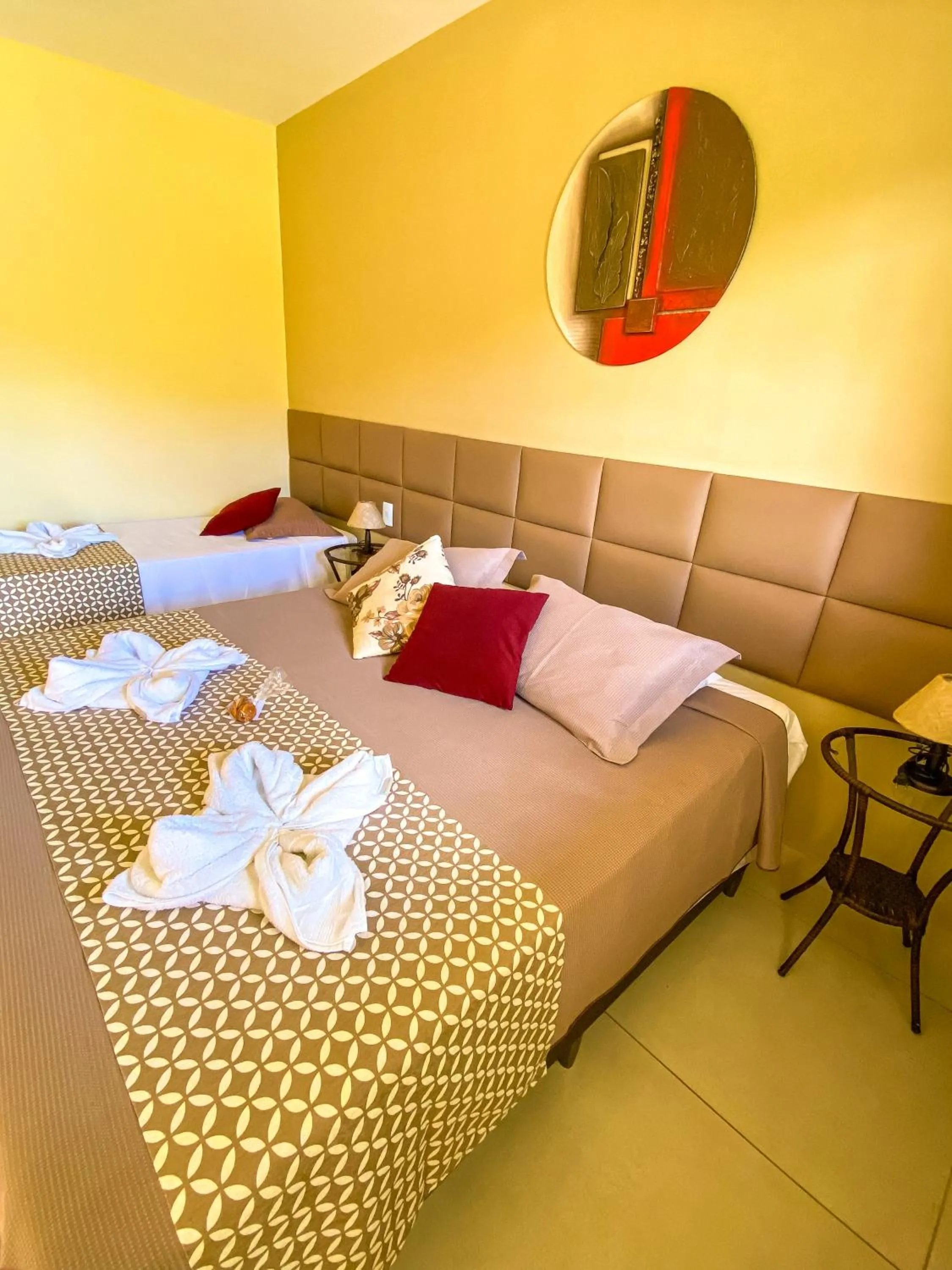 Bed in Pousada Flores do Campo