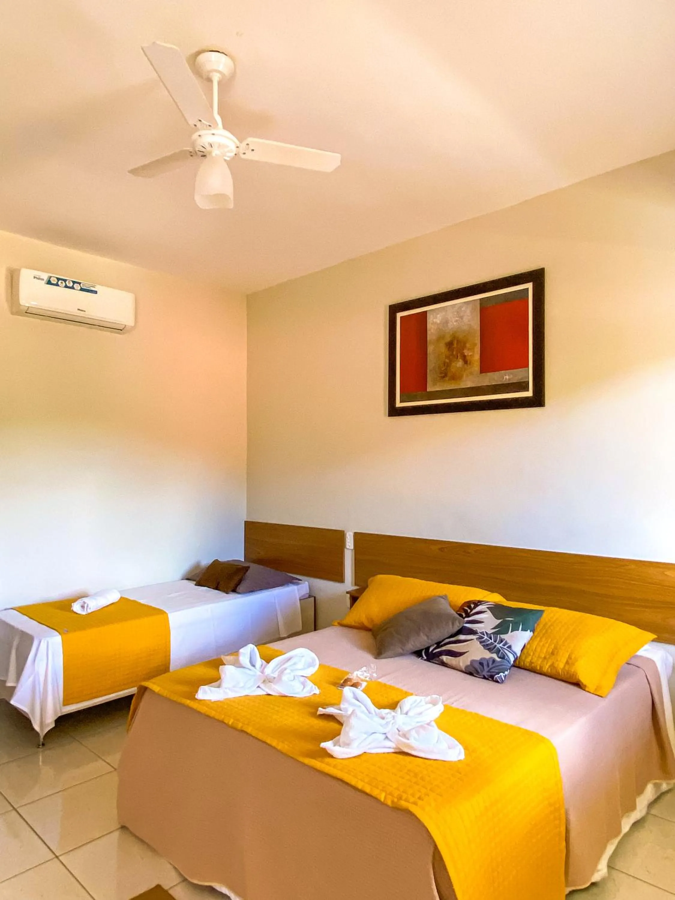 Bed in Pousada Flores do Campo