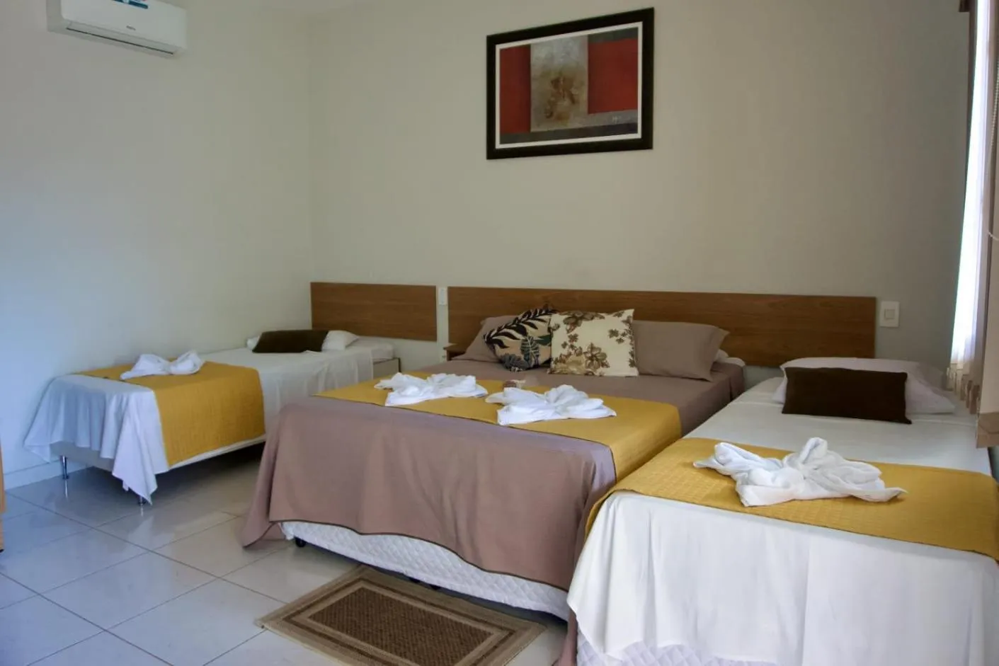 Bed in Pousada Flores do Campo