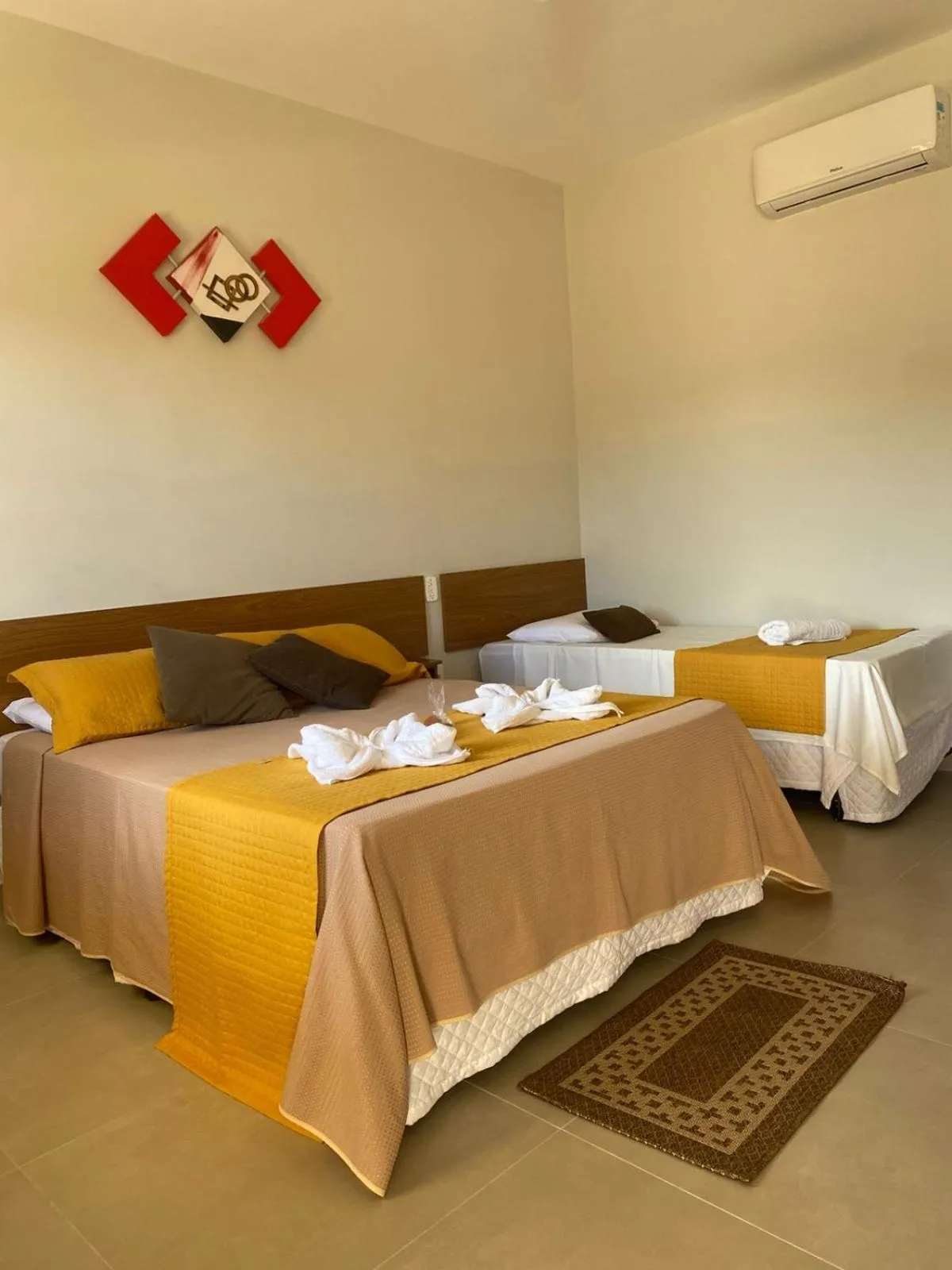 Bed in Pousada Flores do Campo