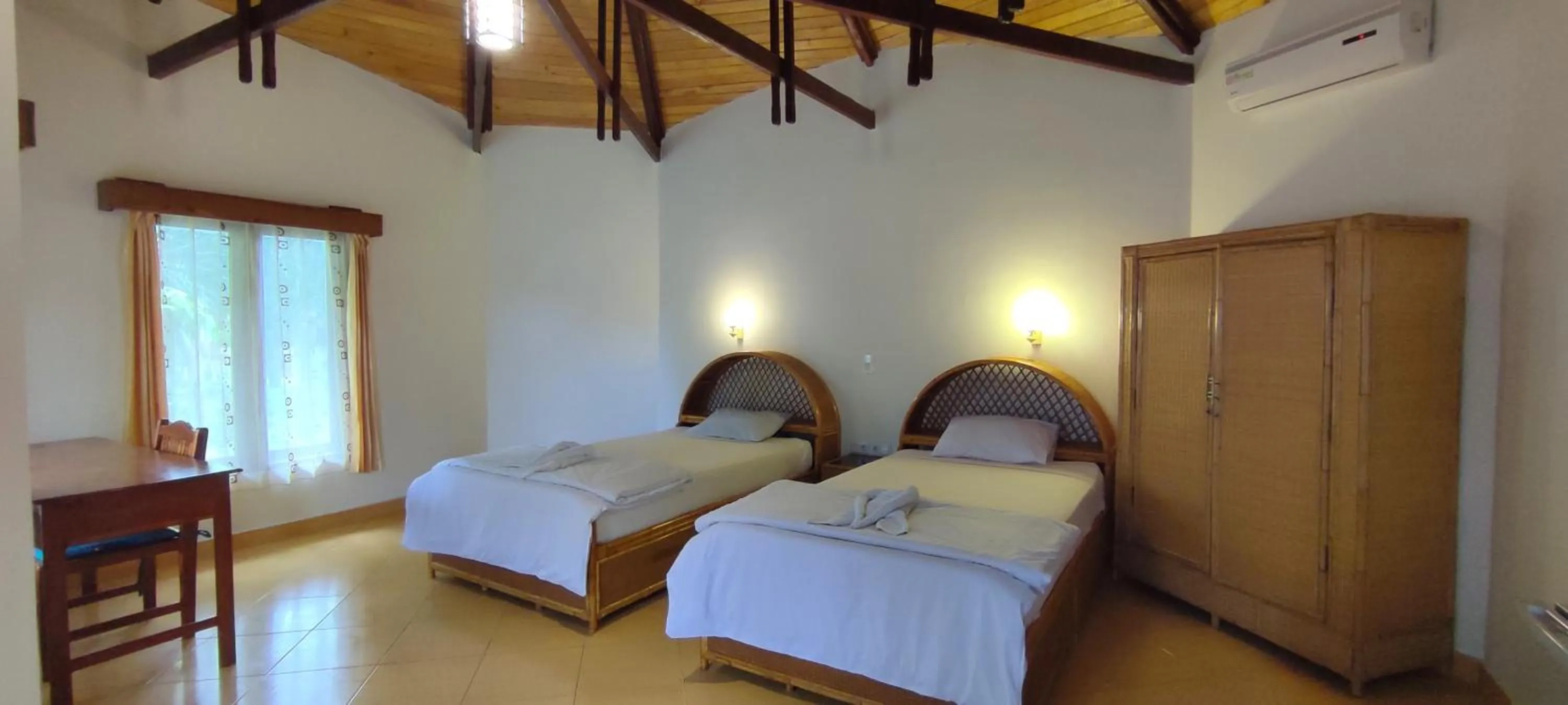 Bedroom, Bed in Bara Beach Bungalows