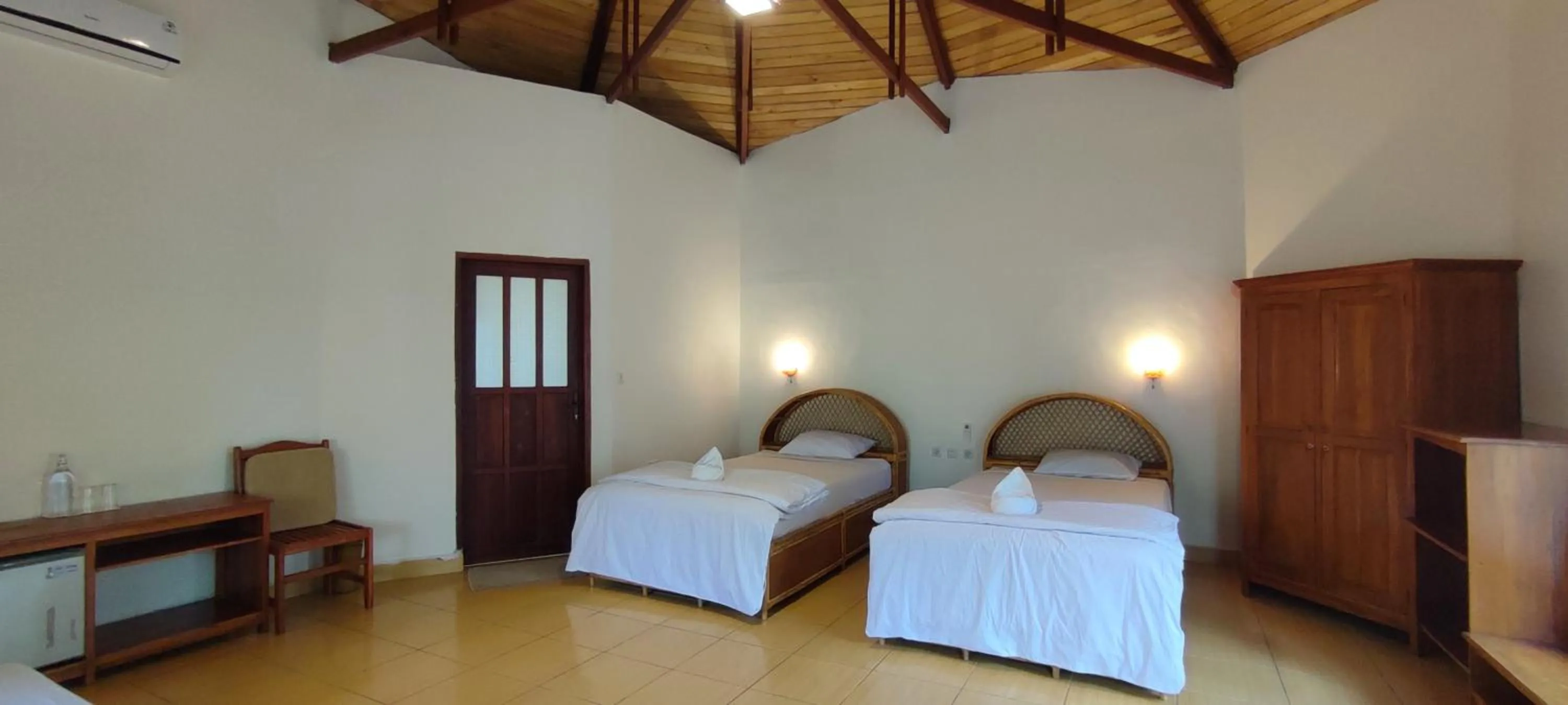 Bedroom, Bed in Bara Beach Bungalows