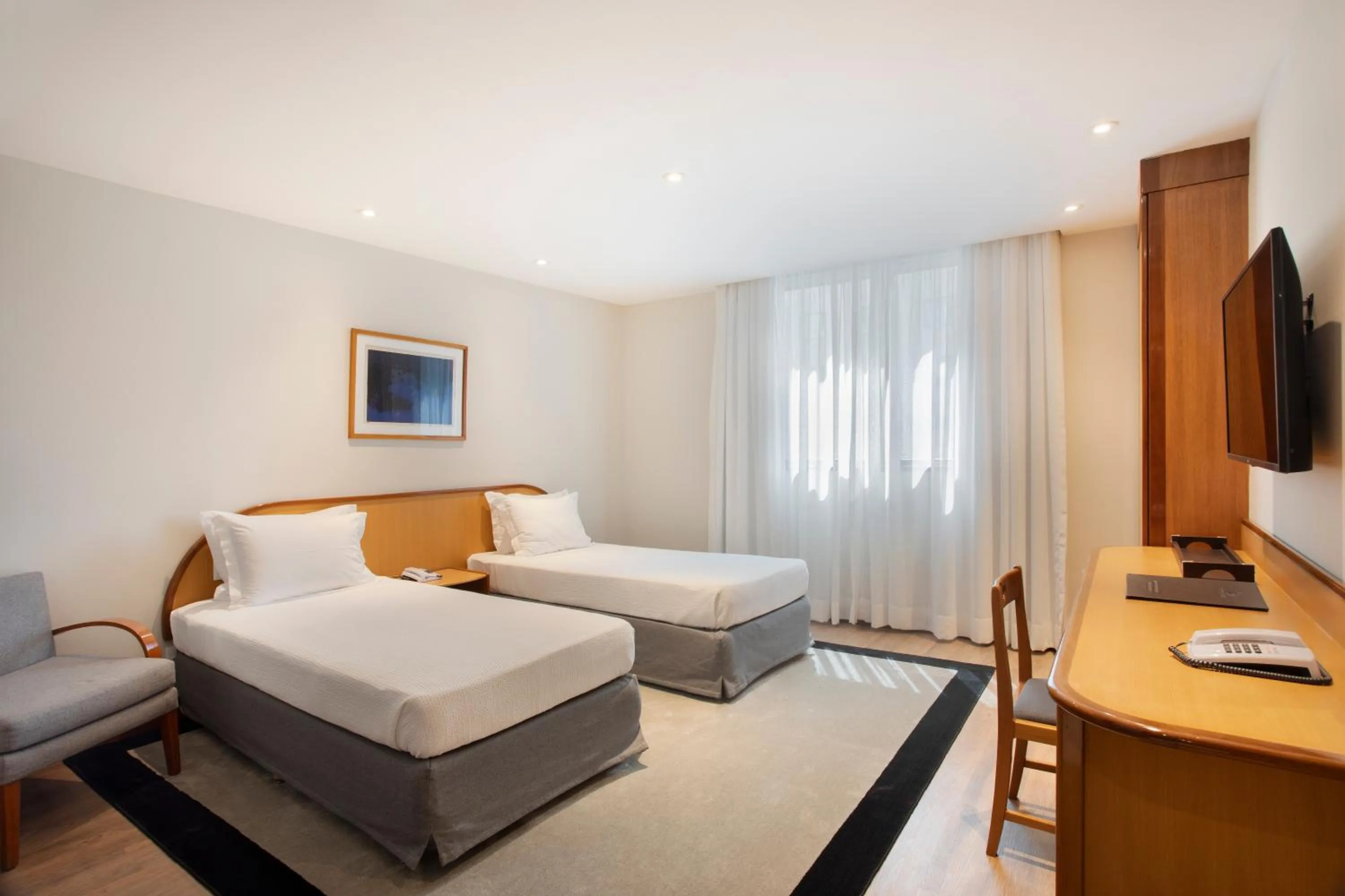 Bed in Windsor Guanabara Hotel