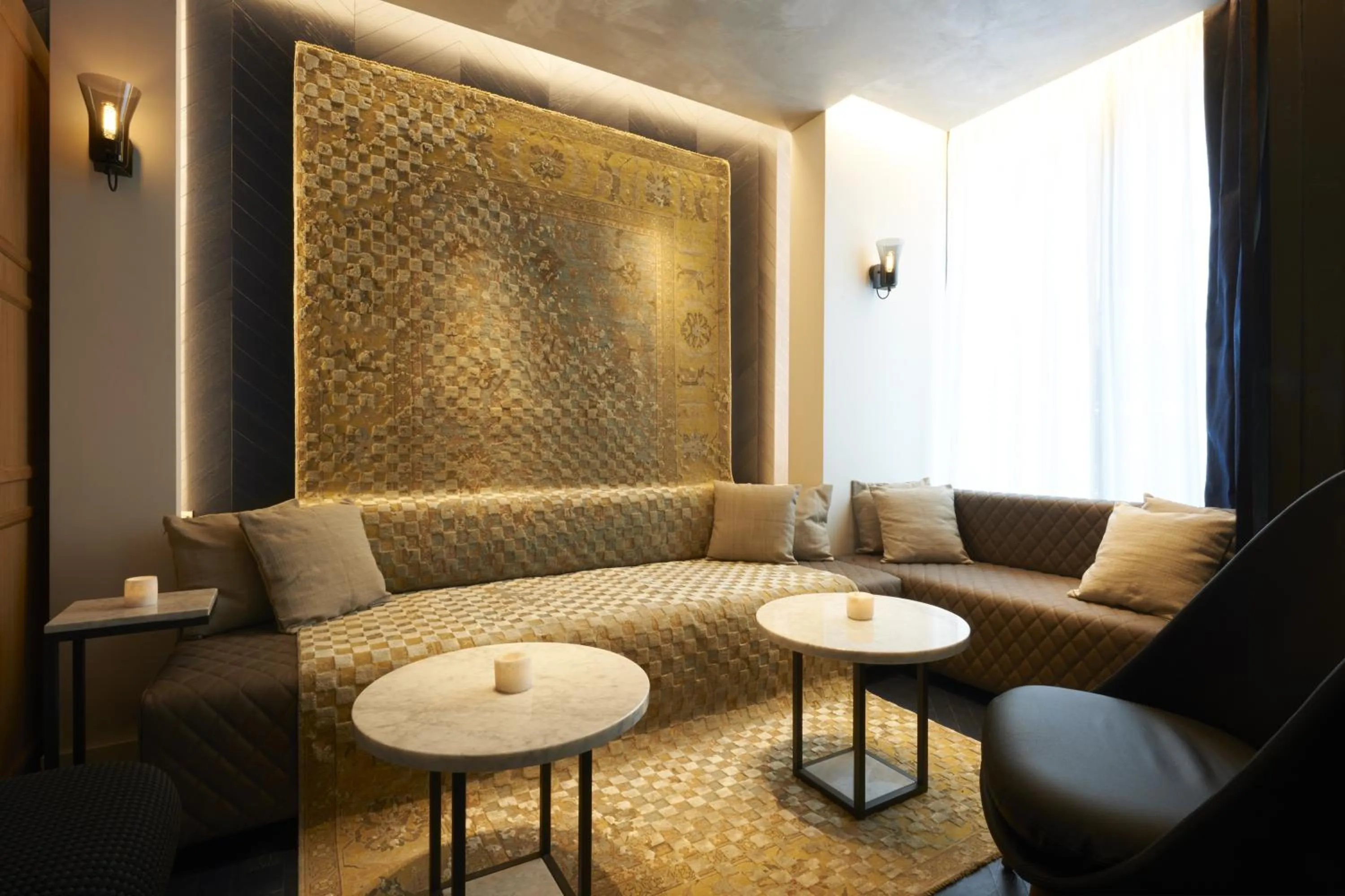 Seating area in Perpetual Elysée Montaigne