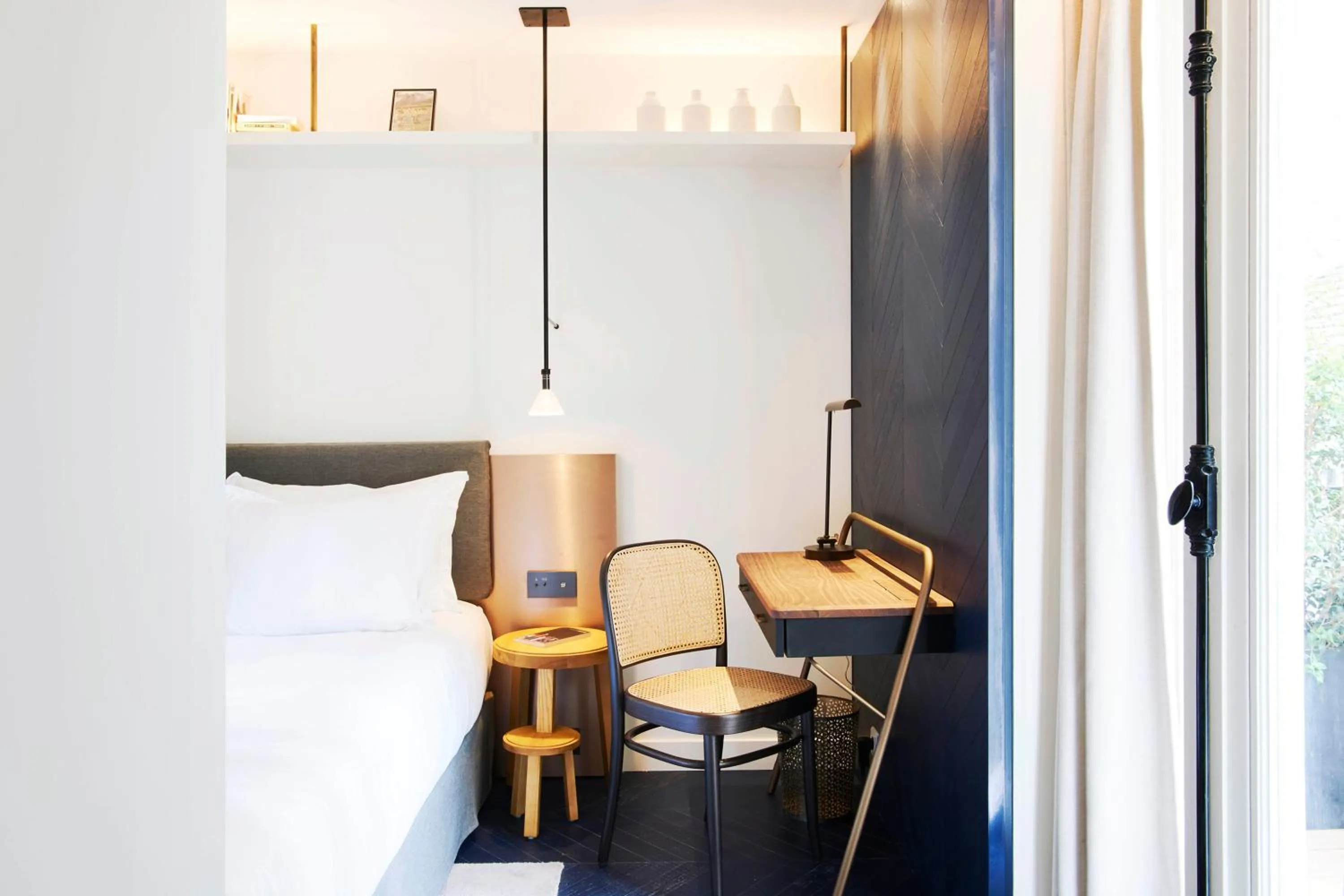 Bedroom in Perpetual Elysée Montaigne