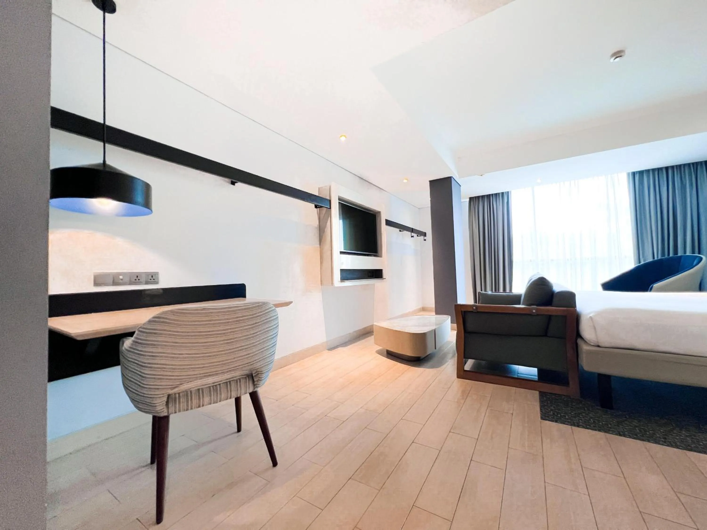 Living room, Bed in ibis Styles Batam Nagoya