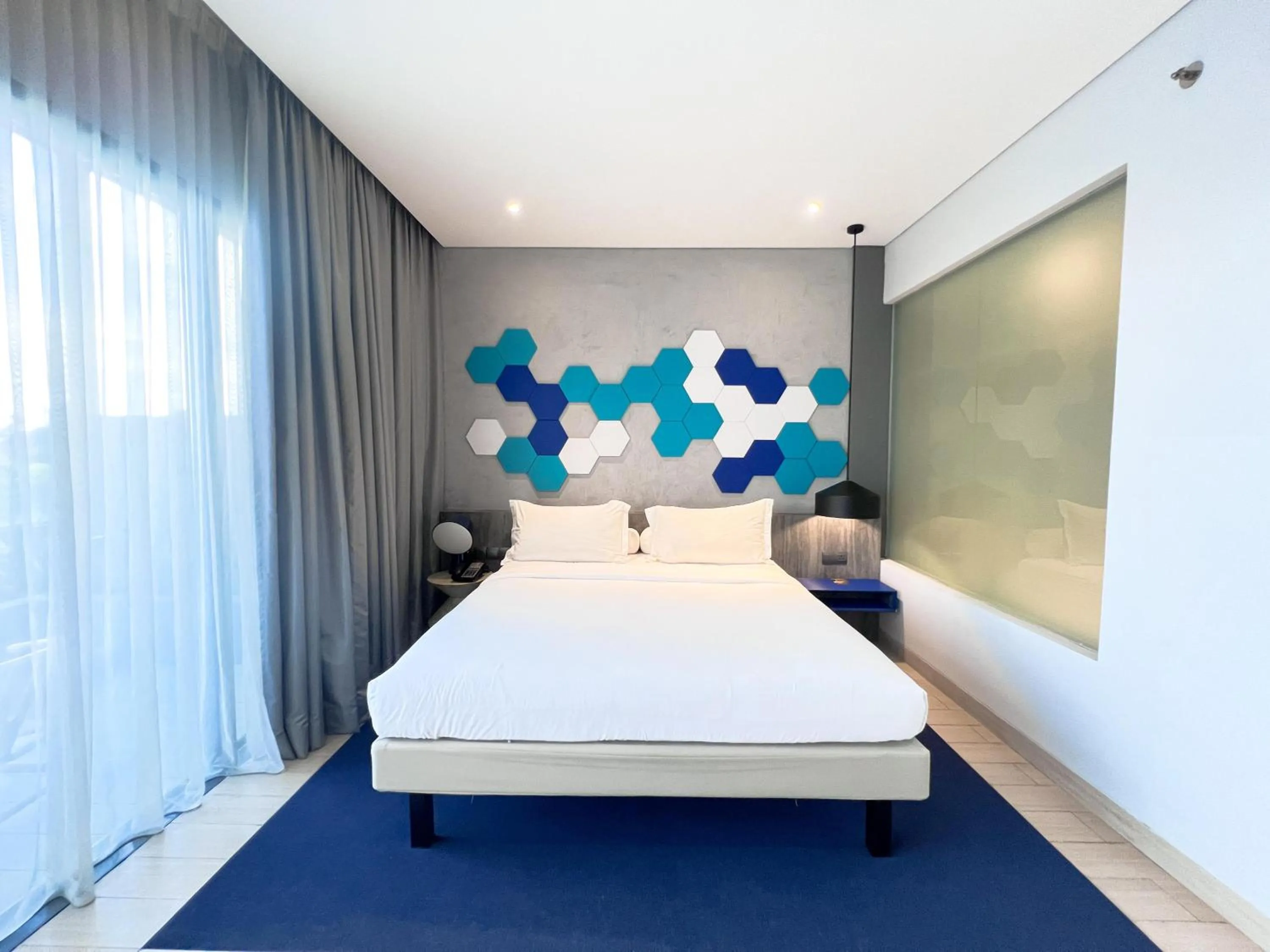 Living room, Bed in ibis Styles Batam Nagoya