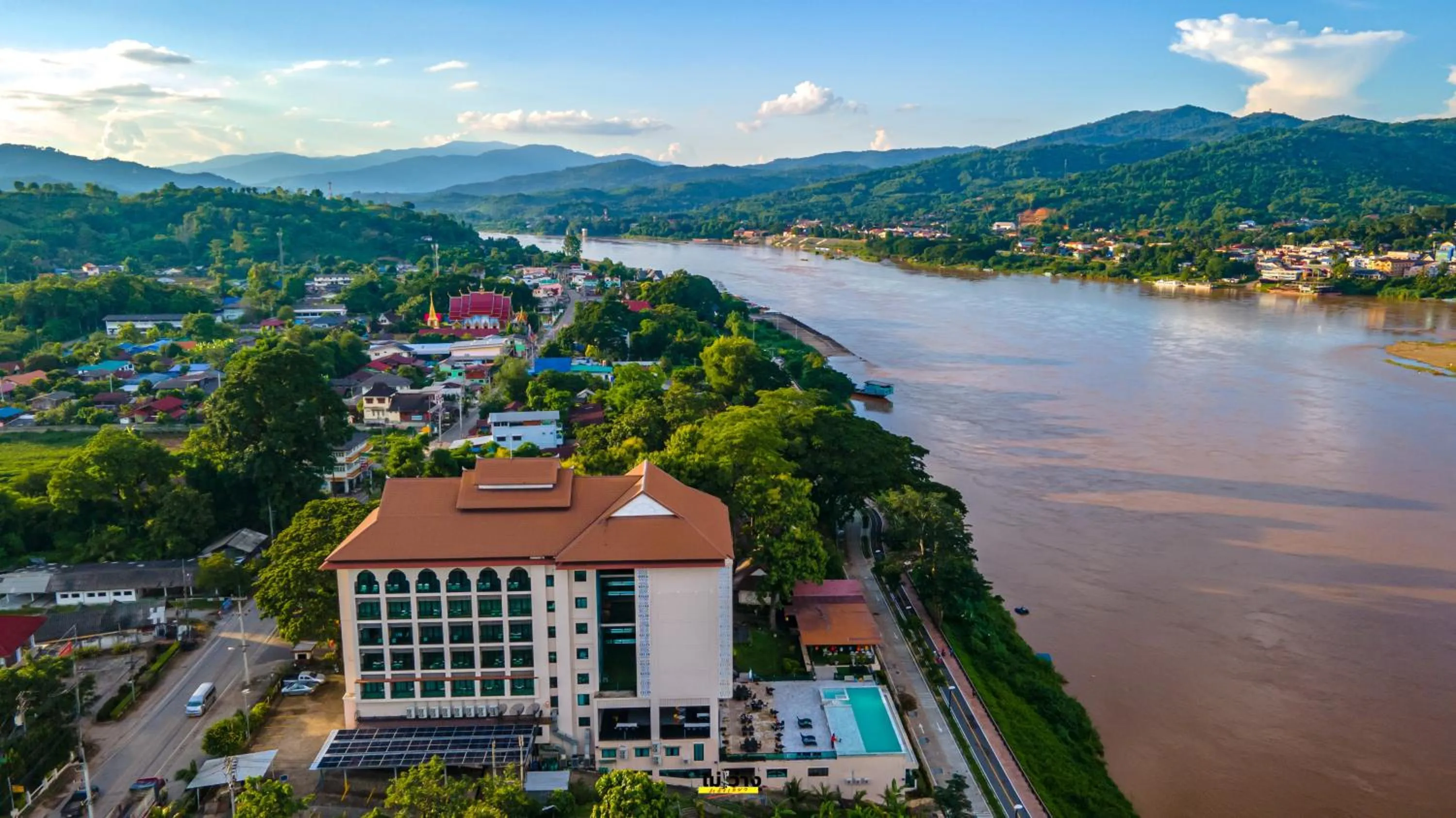 Swimming pool in Chiangkhong Teak Garden Riverfront Onsen Hotel- SHA Extra Plus