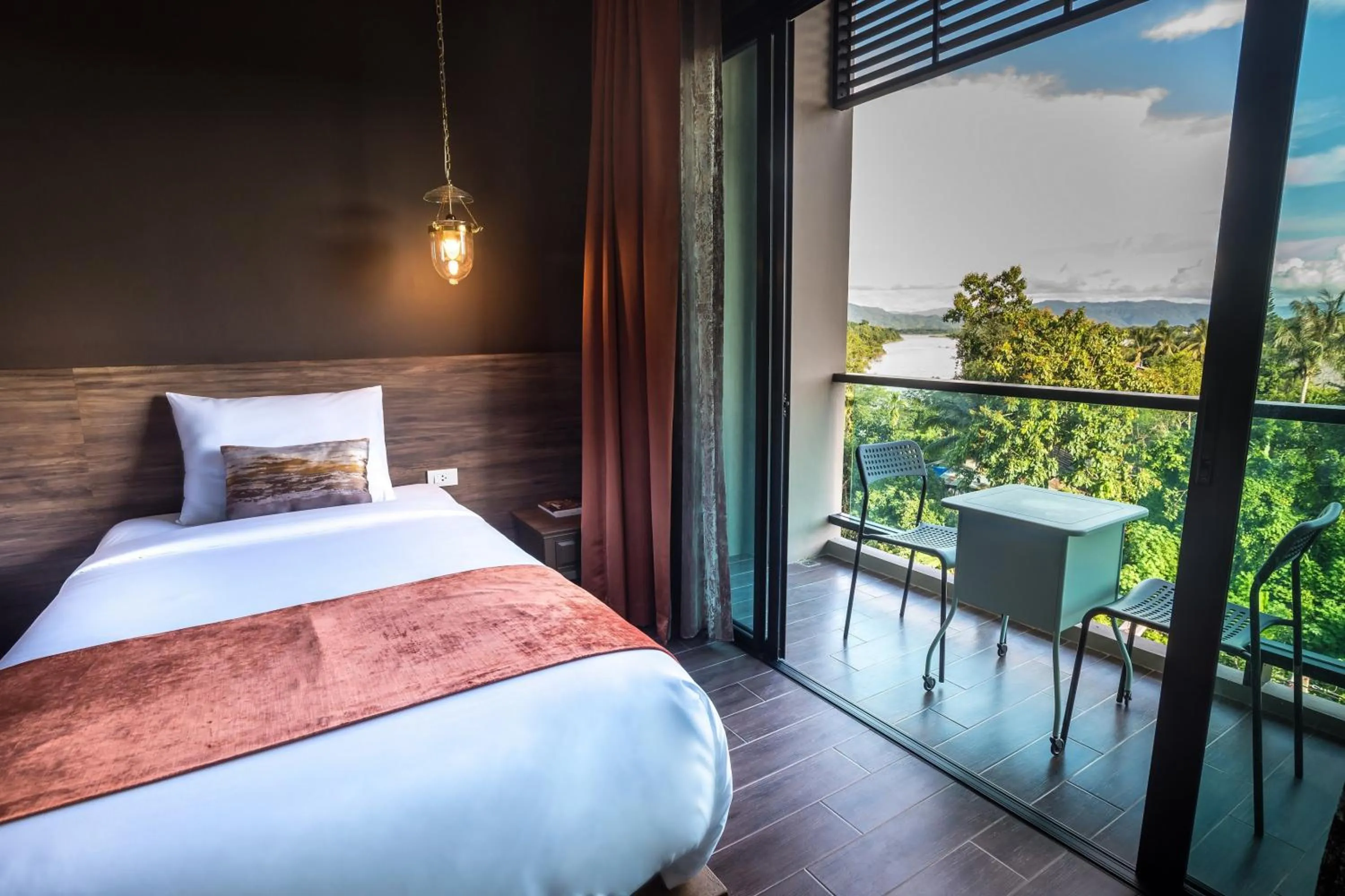 Seating area, Bed in Chiangkhong Teak Garden Riverfront Onsen Hotel- SHA Extra Plus