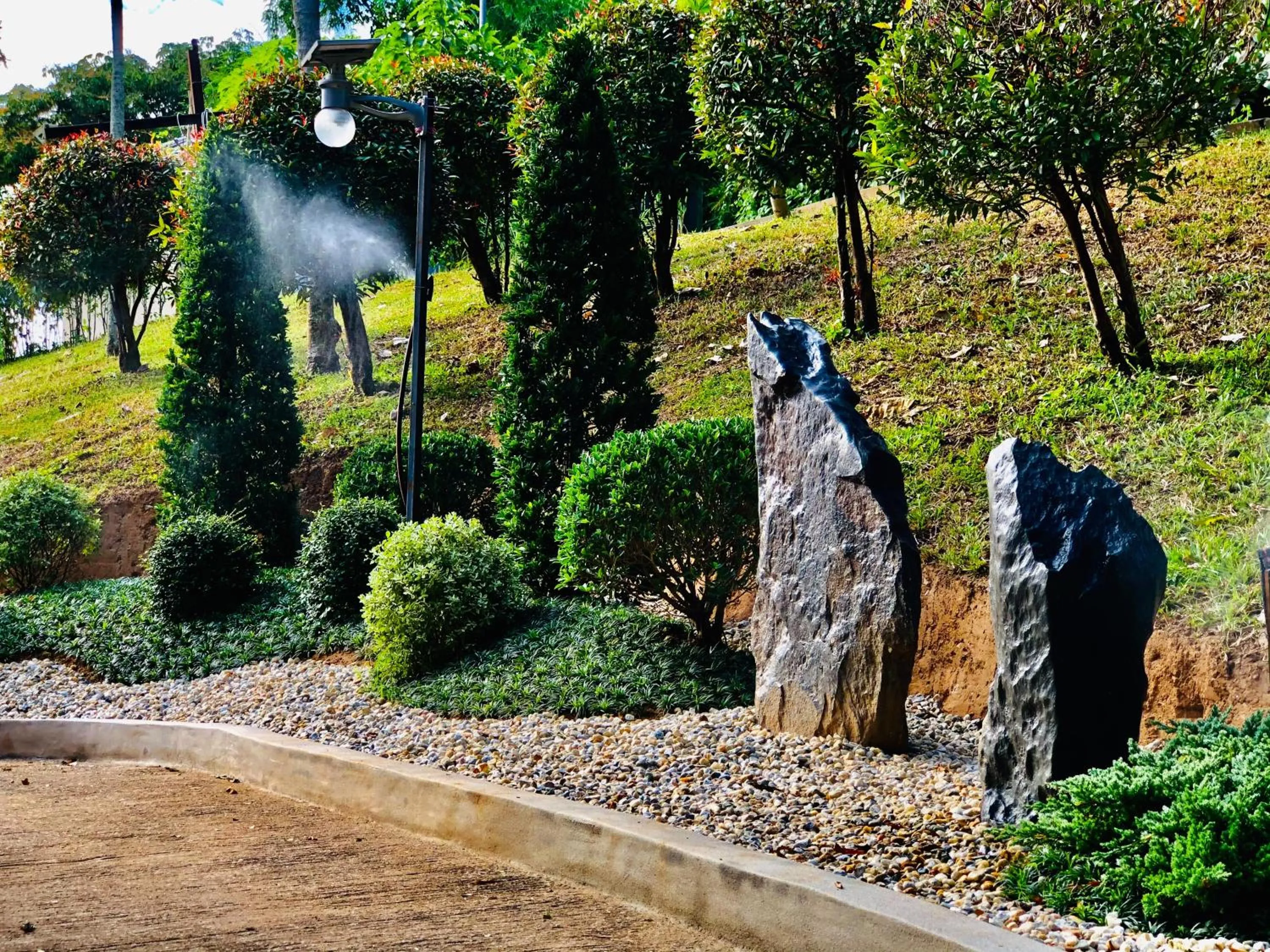 Garden view in Chiangkhong Teak Garden Riverfront Onsen Hotel- SHA Extra Plus