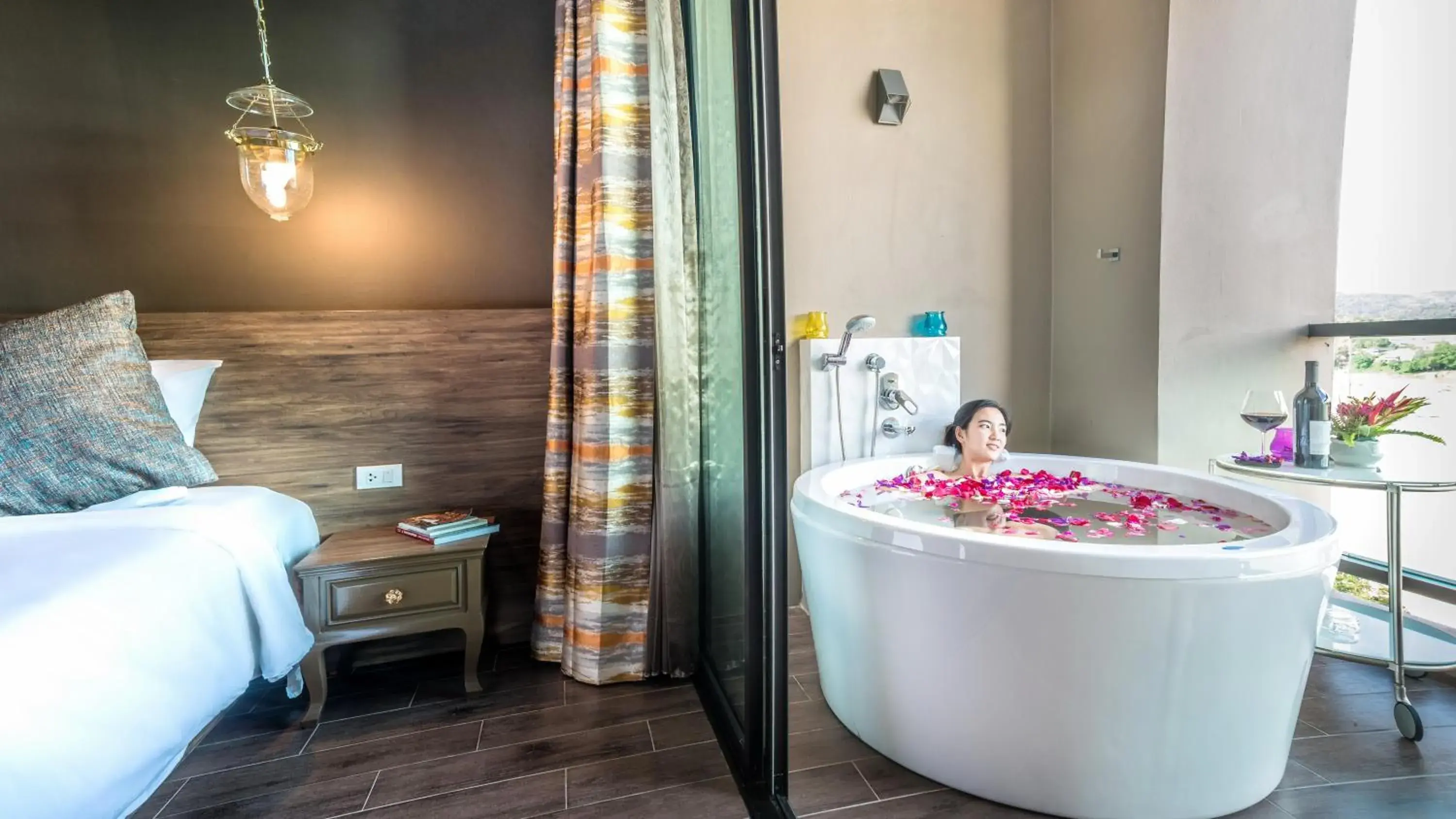 Grand Deluxe River & Swimming pool view with Bath Tub in Chiangkhong Teak Garden Riverfront Onsen Hotel- SHA Extra Plus Grand Deluxe River & Swimming pool view with Bath Tub in Chiangkhong Teak Garden Riverfront Onsen Hotel- SHA Extra Plus