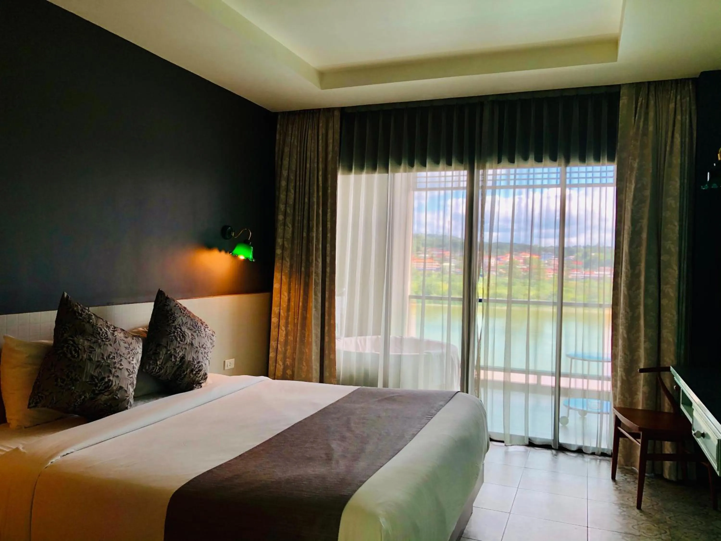 River view, Bed in Chiangkhong Teak Garden Riverfront Onsen Hotel- SHA Extra Plus