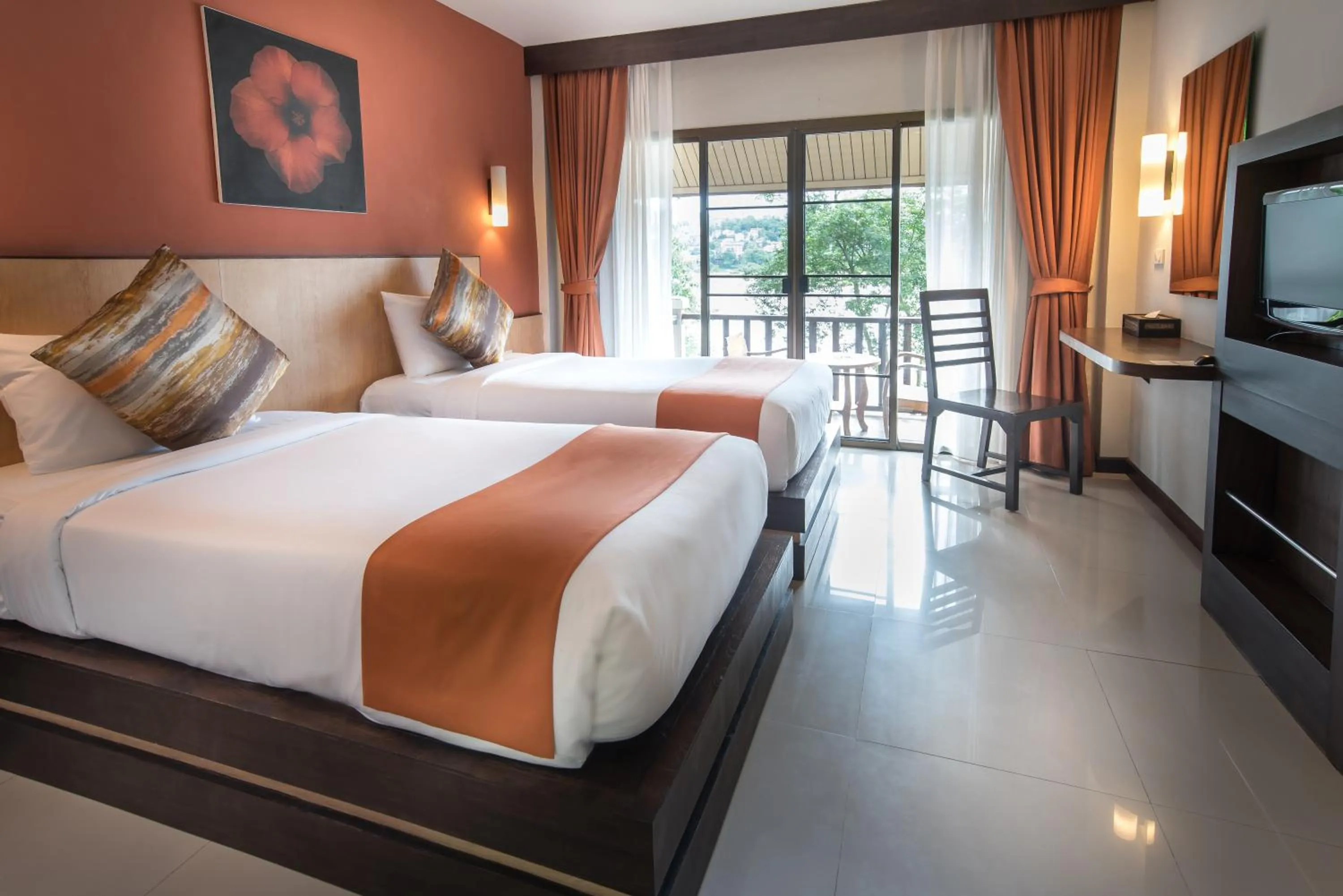 Photo of the whole room, Bed in Chiangkhong Teak Garden Riverfront Onsen Hotel- SHA Extra Plus