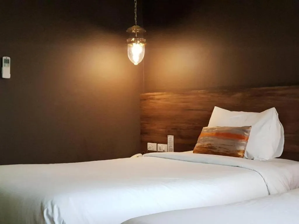 Photo of the whole room, Bed in Chiangkhong Teak Garden Riverfront Onsen Hotel- SHA Extra Plus