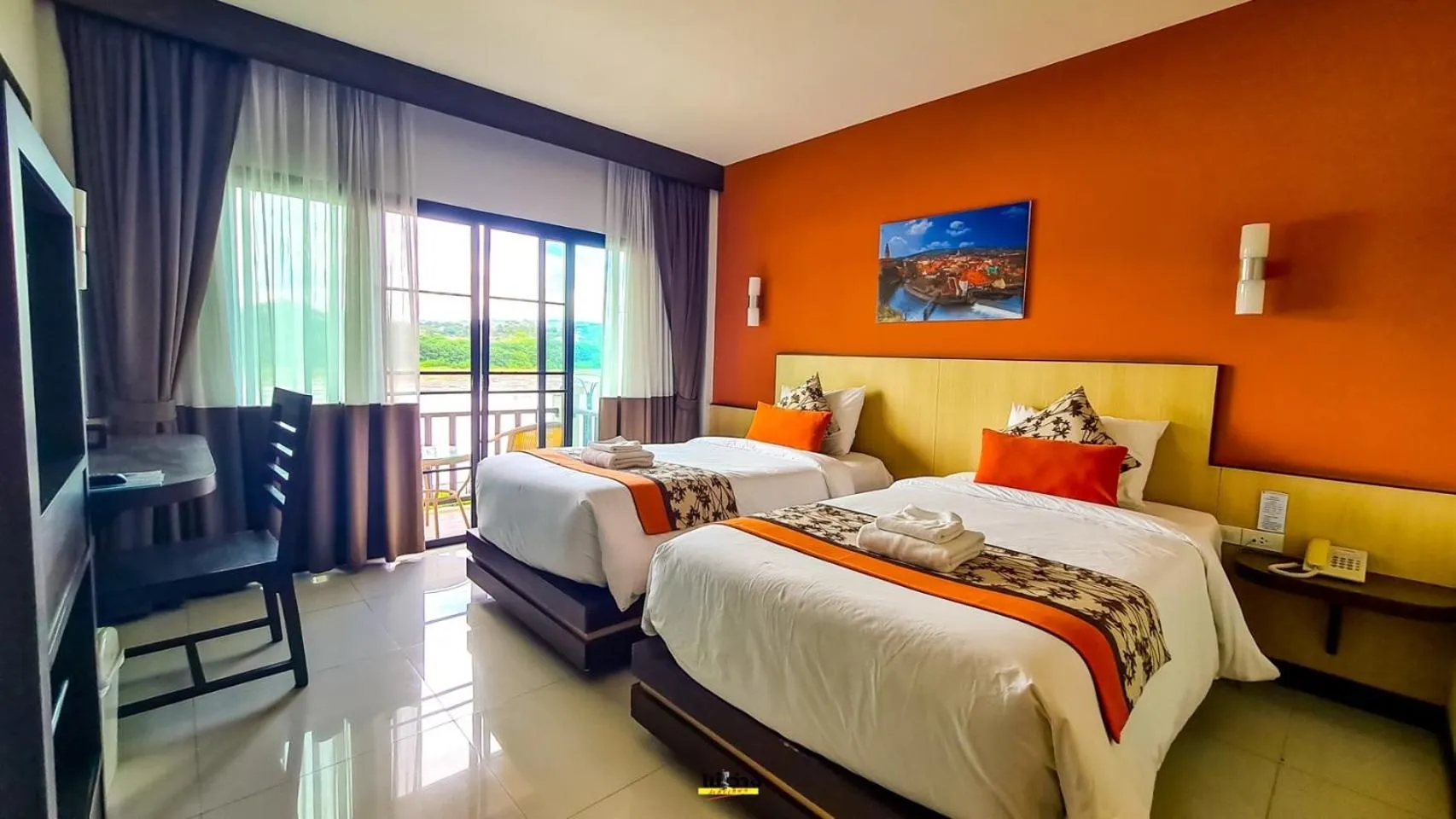 Bed in Chiangkhong Teak Garden Riverfront Onsen Hotel- SHA Extra Plus