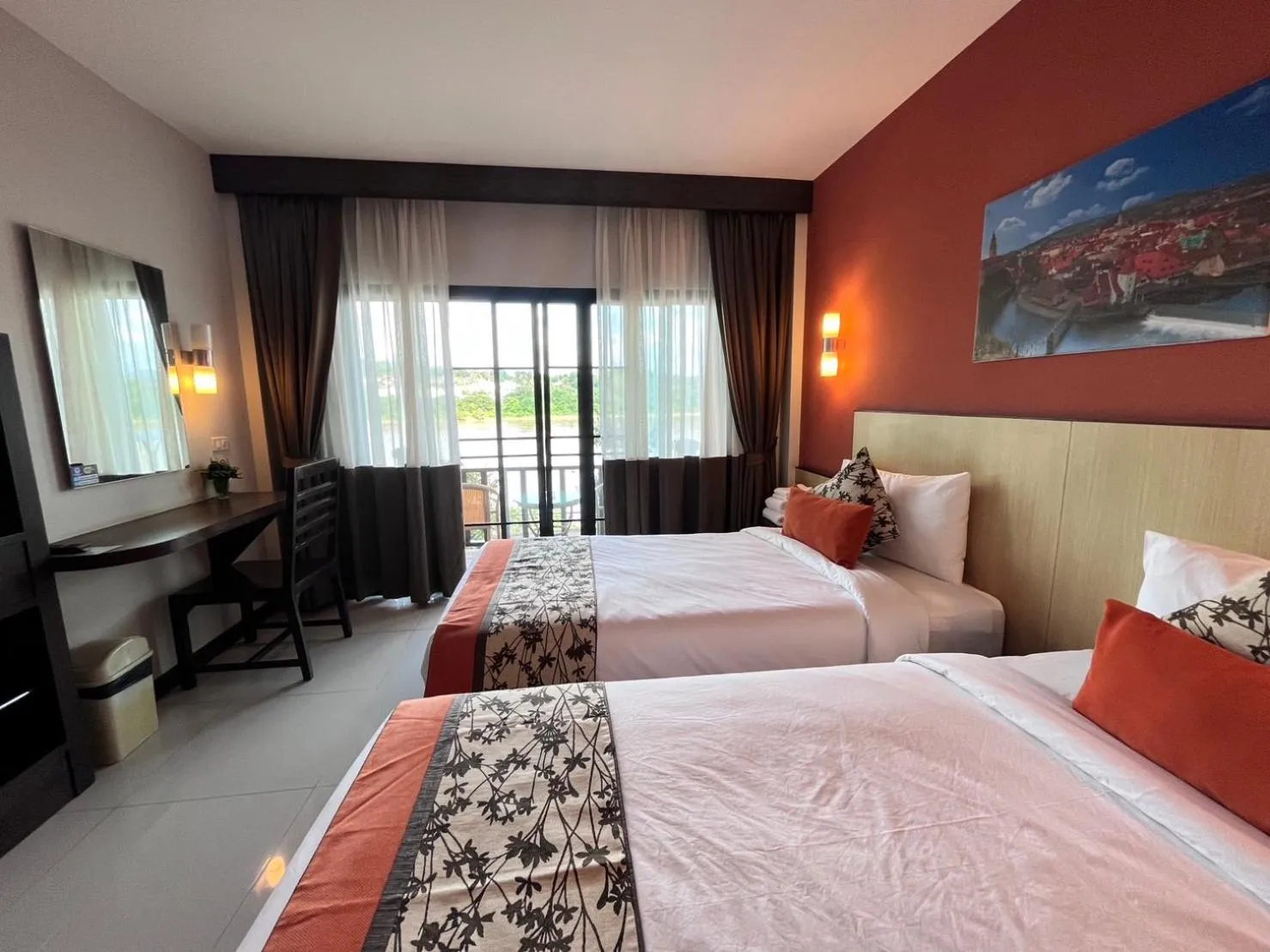 Photo of the whole room, Bed in Chiangkhong Teak Garden Riverfront Onsen Hotel- SHA Extra Plus