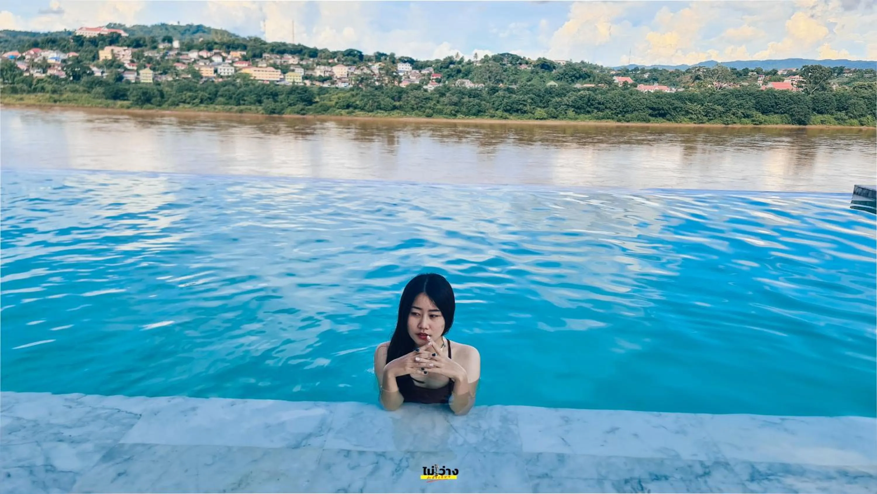 Swimming pool in Chiangkhong Teak Garden Riverfront Onsen Hotel- SHA Extra Plus