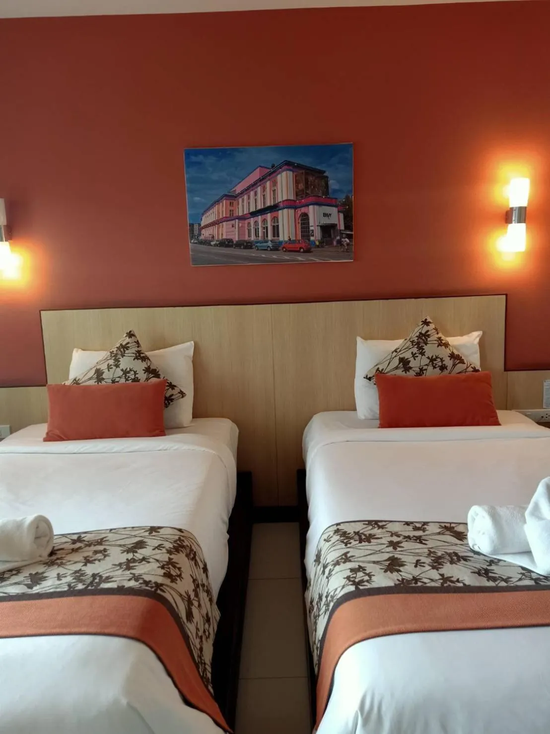 Bed in Chiangkhong Teak Garden Riverfront Onsen Hotel- SHA Extra Plus