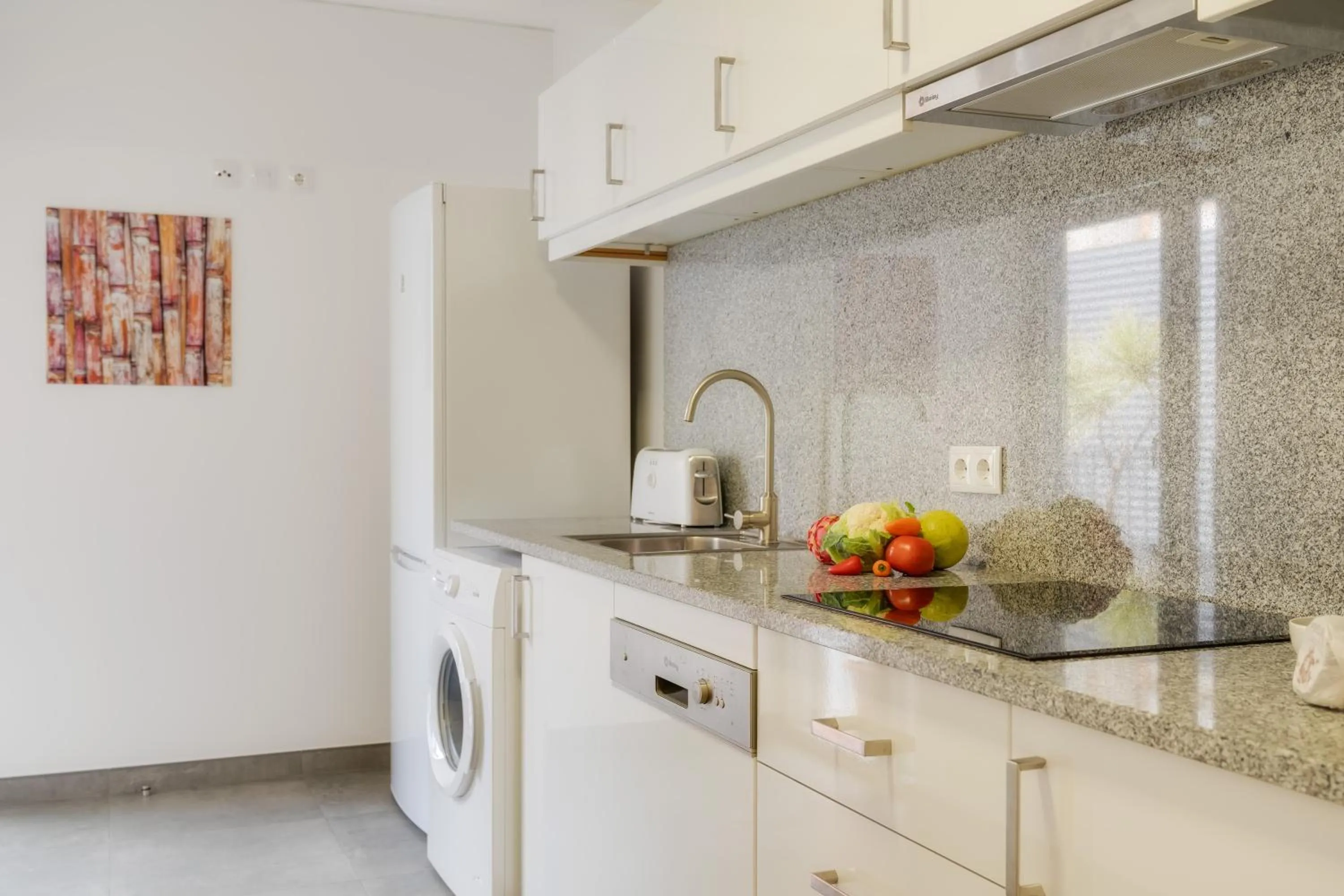 Kitchen or kitchenette in Casa da Praça Apartments - by Casas na Ilha