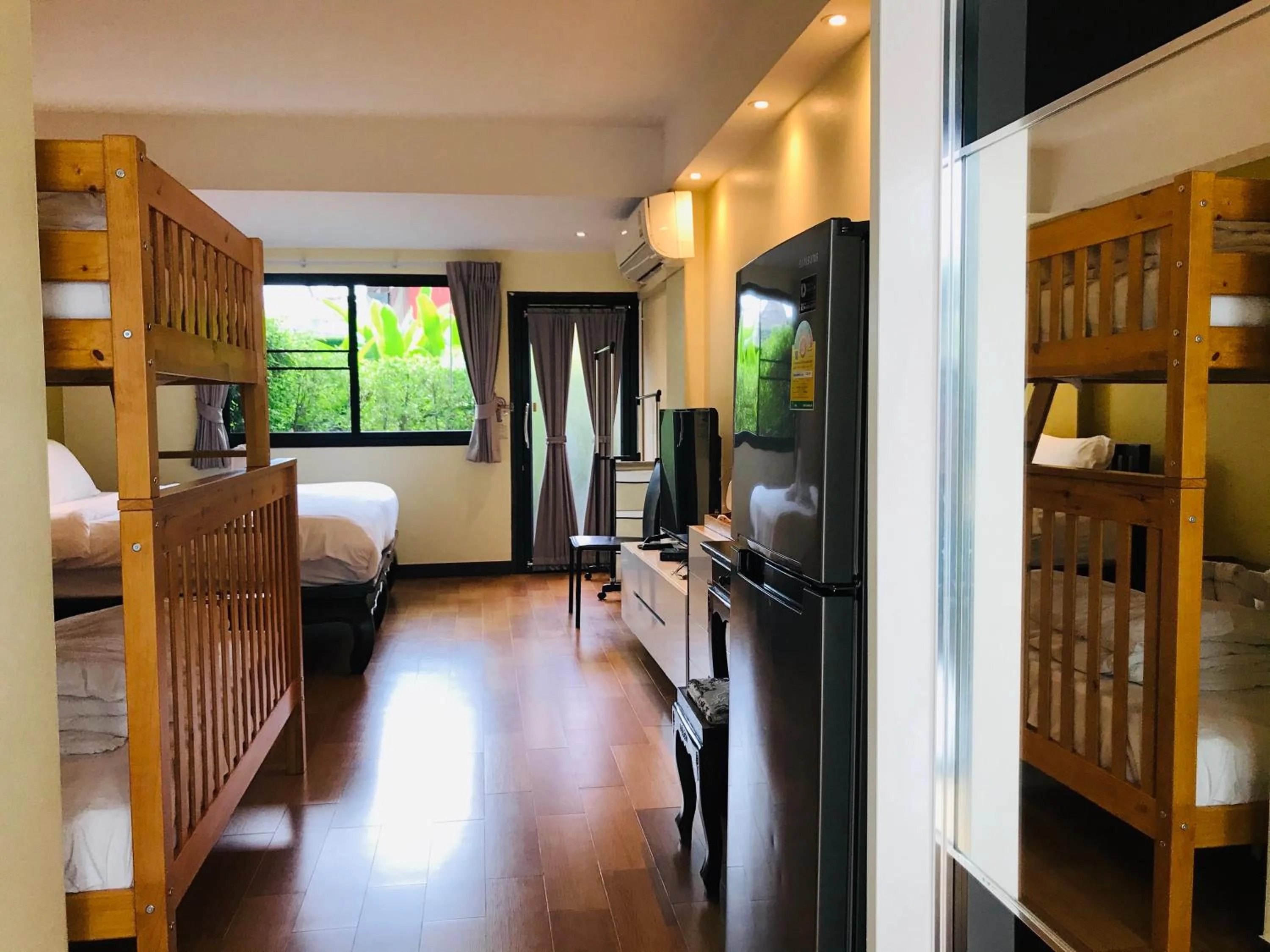 Photo of the whole room, Bed in Baan Sang Singh