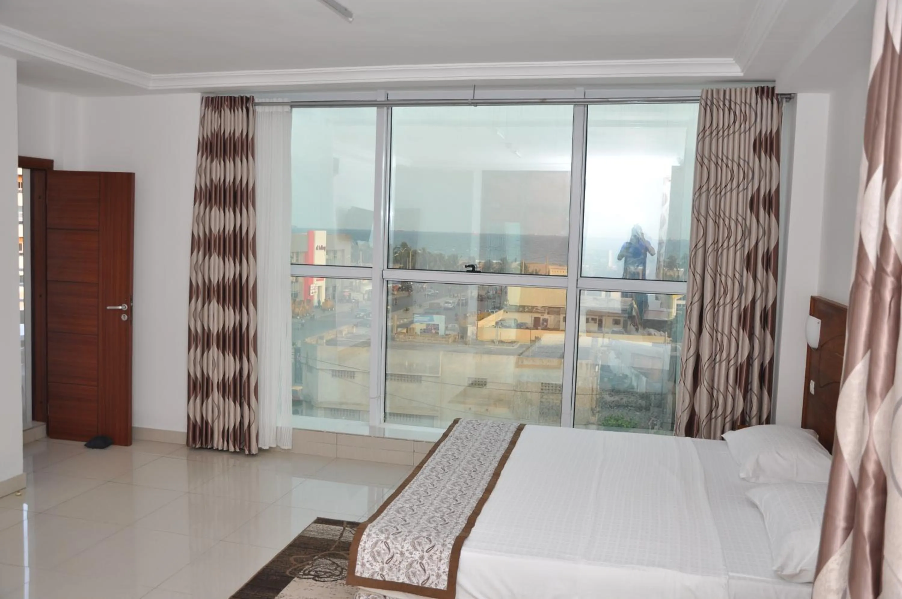 Bed in Rosalie's Suites