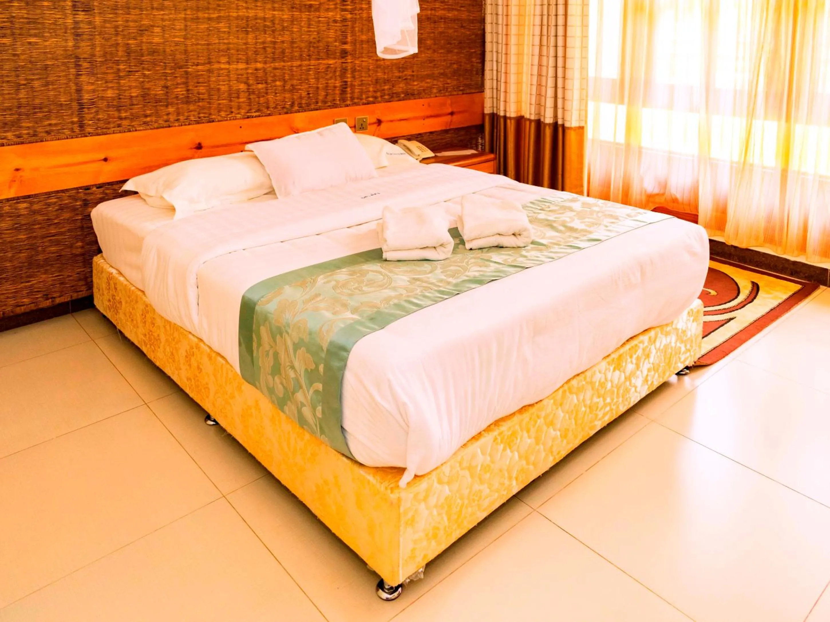 Bed in Kalya Courts Hotel Fort Portal