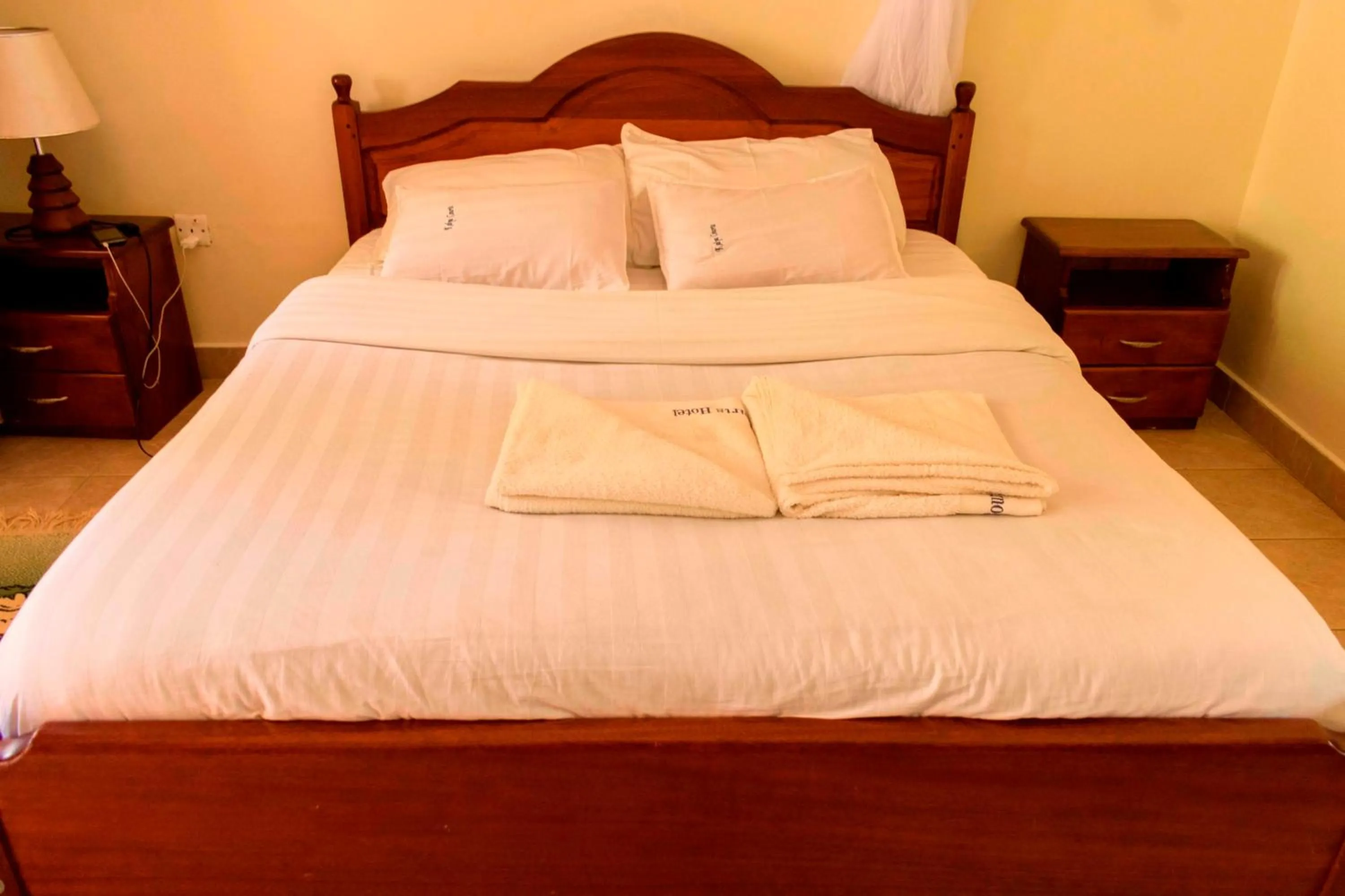 Bed in Kalya Courts Hotel Fort Portal