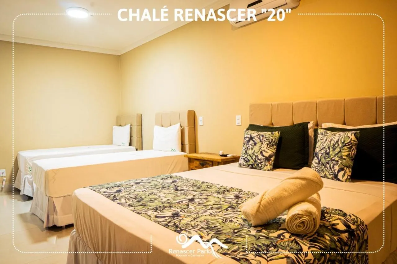 Bed in Pousada Renascer Park