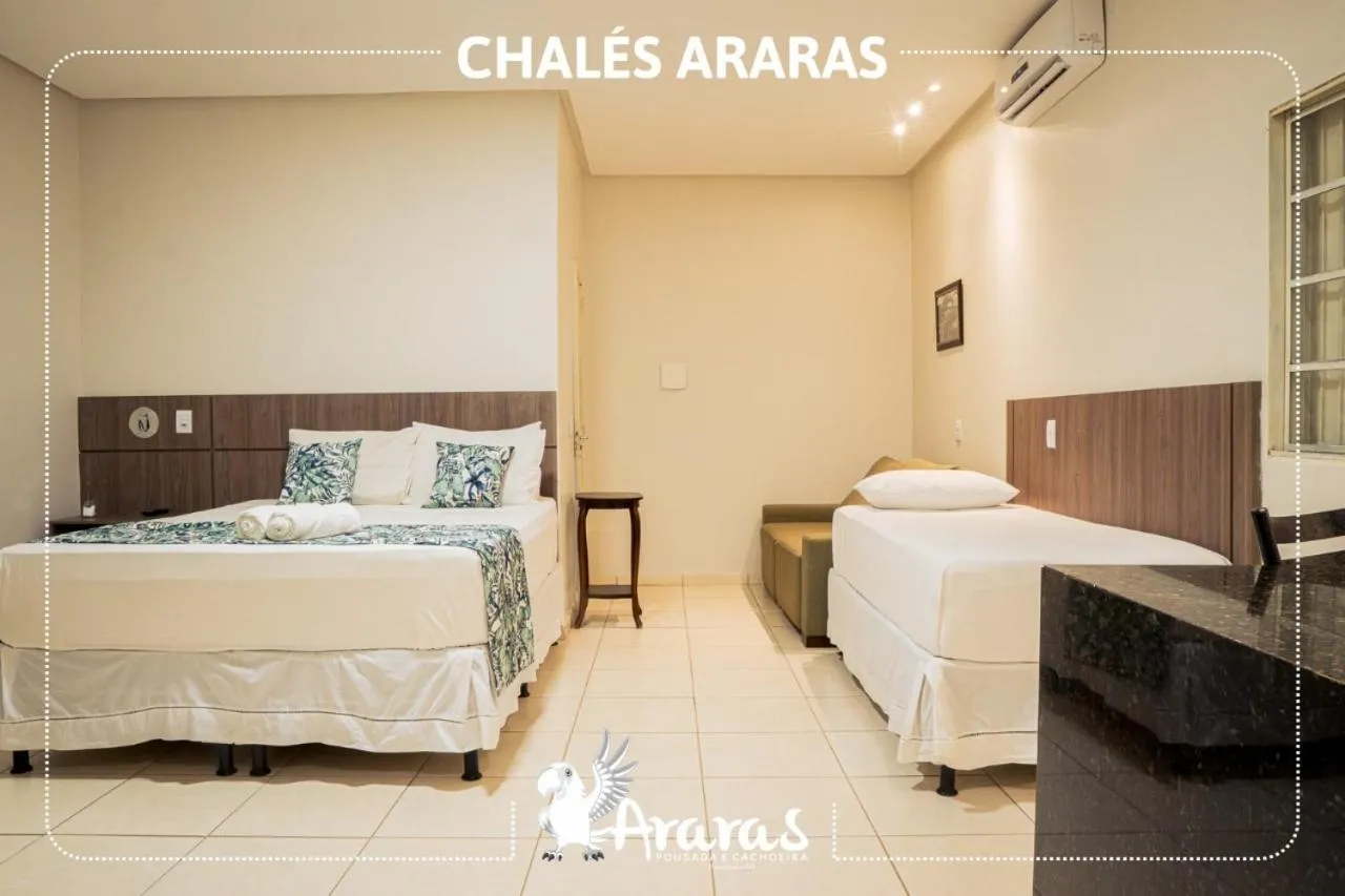 Bed in Pousada Renascer Park