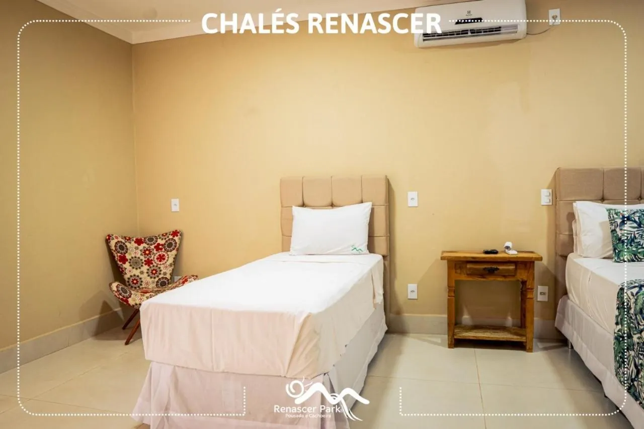 Bed in Pousada Renascer Park