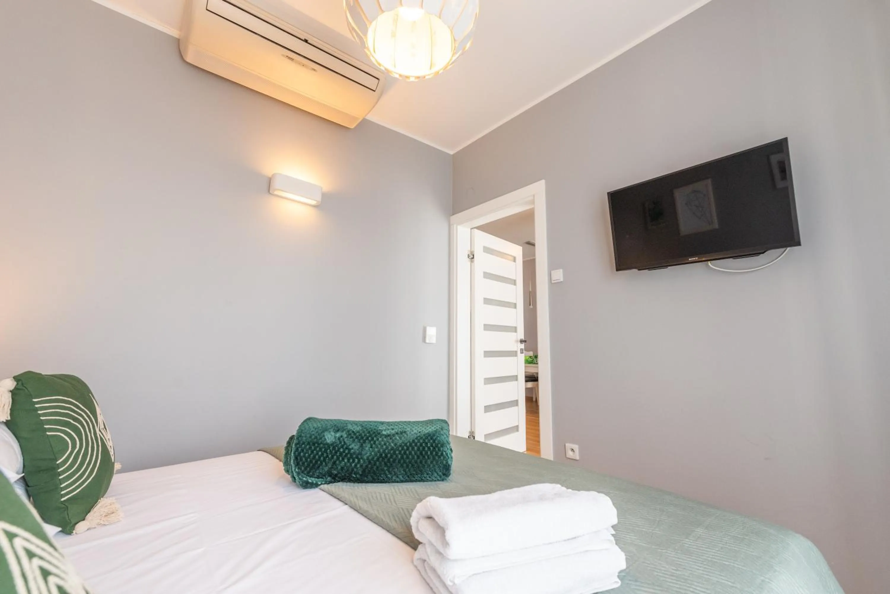 TV and multimedia, Bed in City Lights Apartments