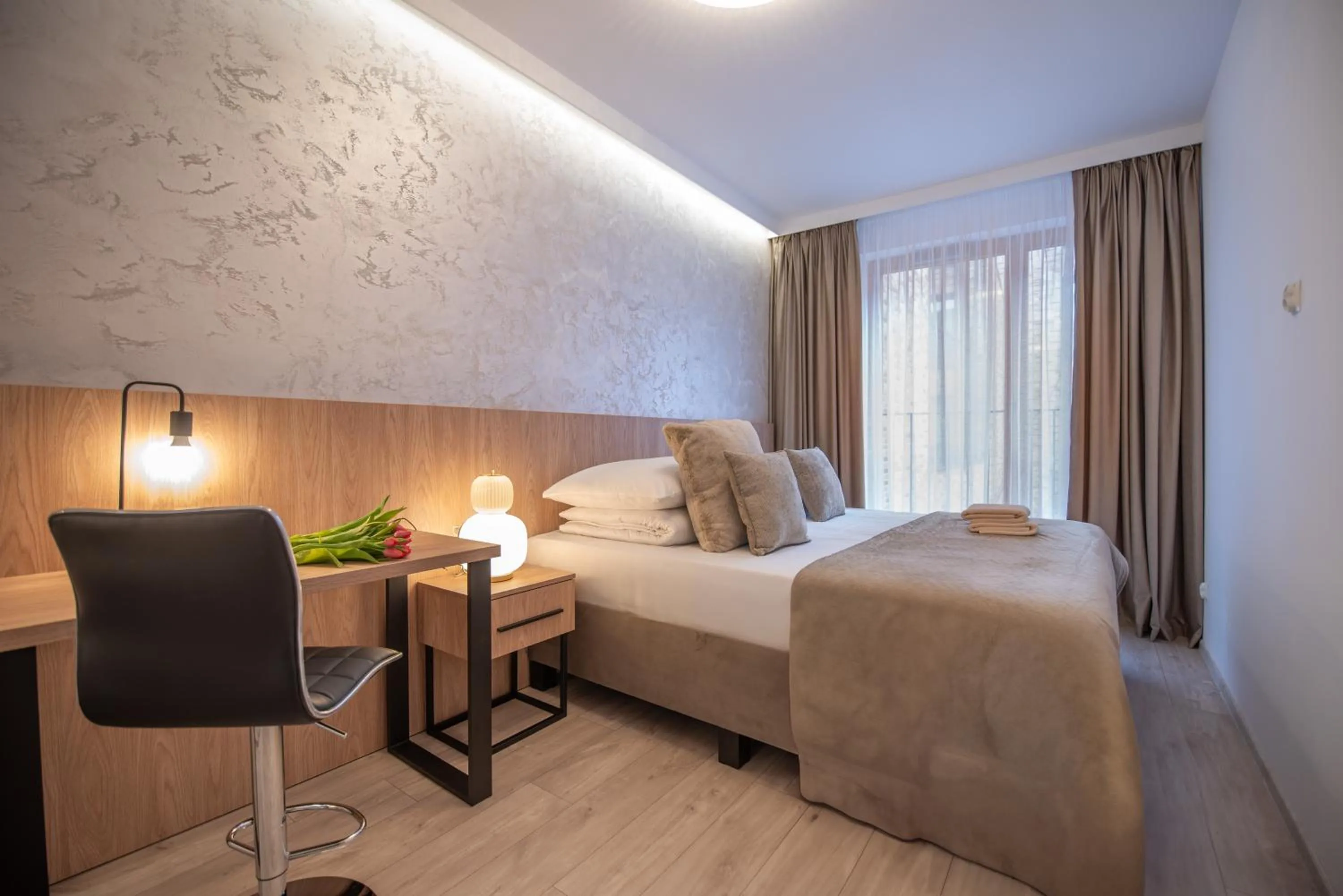 Bed in City Lights Apartments