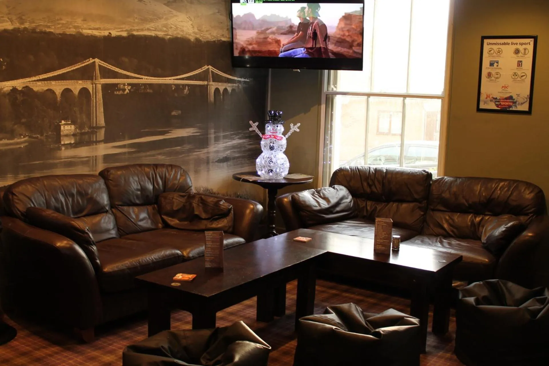 Communal lounge/ TV room in The Menai Hotel and Bar