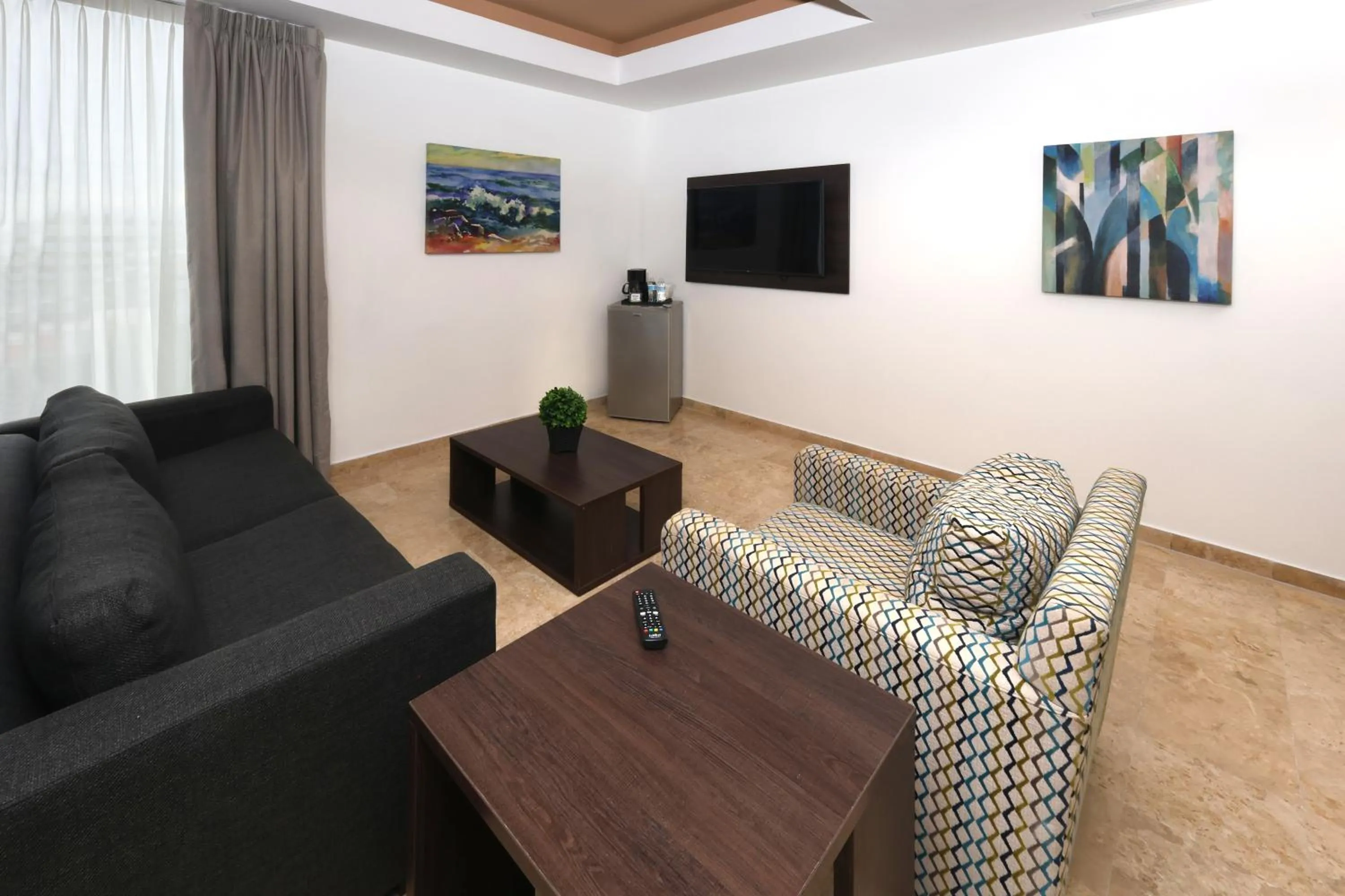 Communal lounge/ TV room in Holiday Inn Resort Mazatlan by IHG
