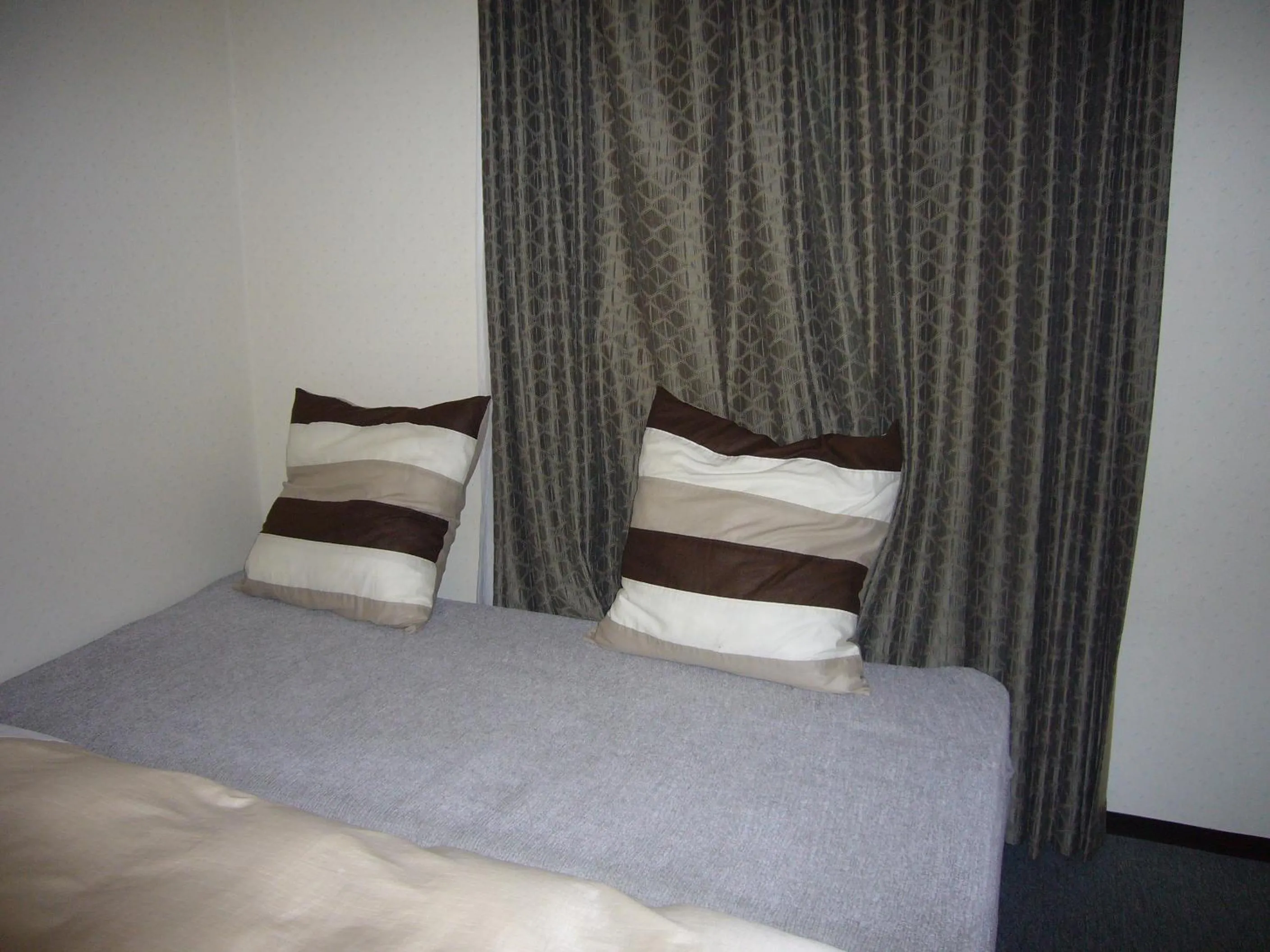 Bed in Hotel Crown Hills Nakamura